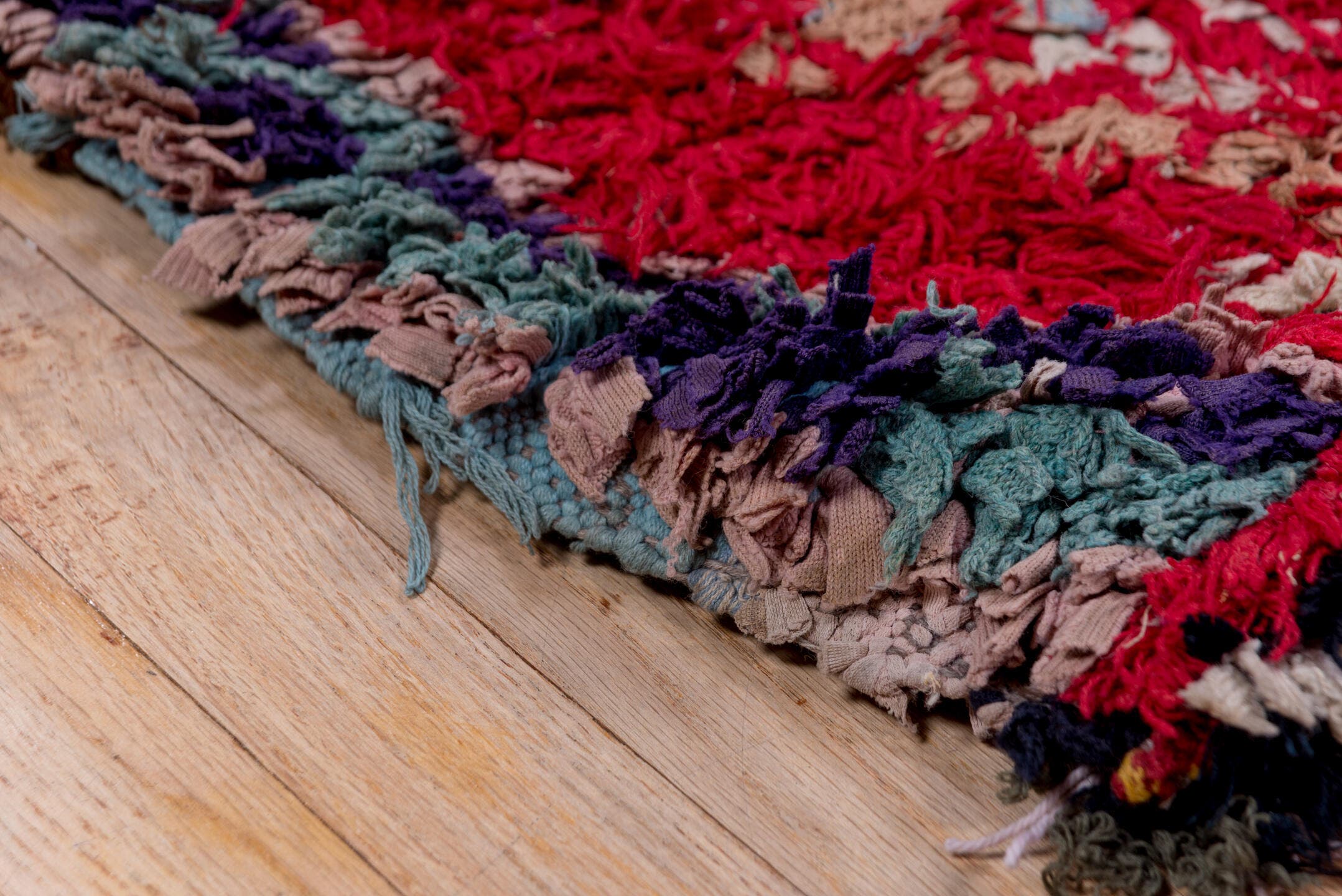 4' x 6' one-of-a-kind handmade vintage Moroccan small size rug. Color palette: crimson, ivory, charcoal, teal, pink, gray