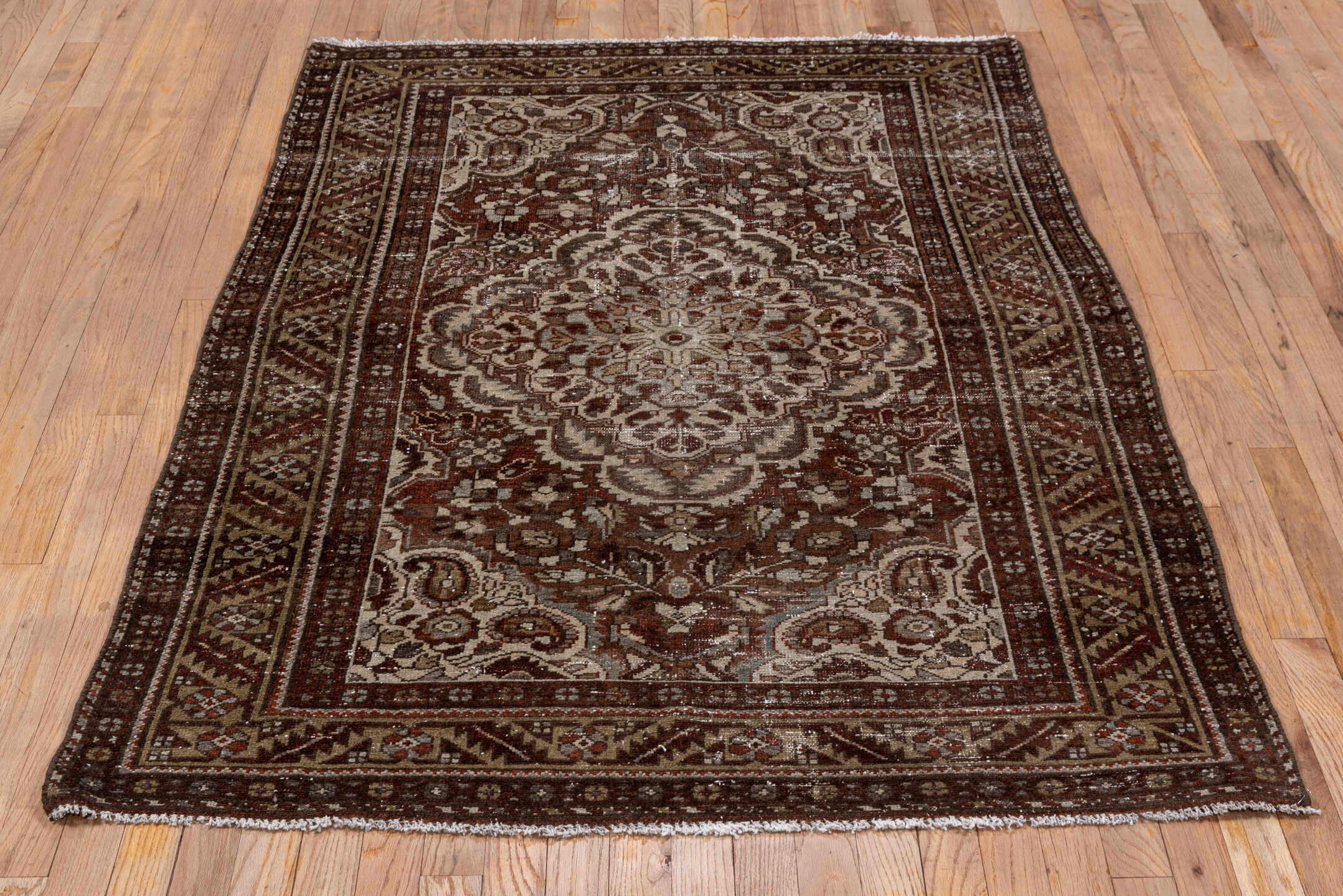 4' x 6' one-of-a-kind handmade vintage Baktiary small size rug. Color palette: brown, dim gray, gray, light gray, pink