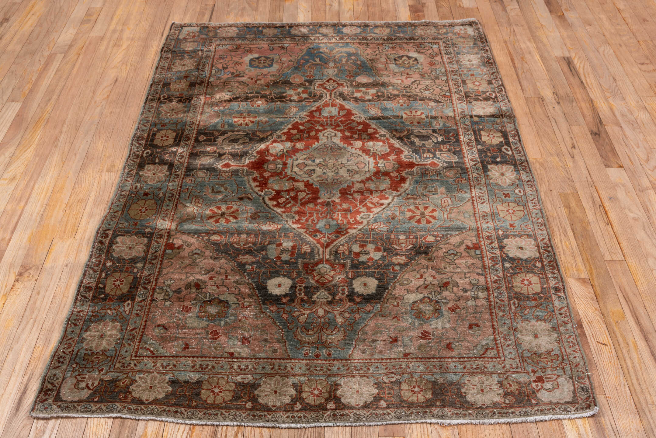 4' x 6' one-of-a-kind handmade antique Sarouk small size rug. Color palette: rose, slate, rust, ivory, charcoal, taupe