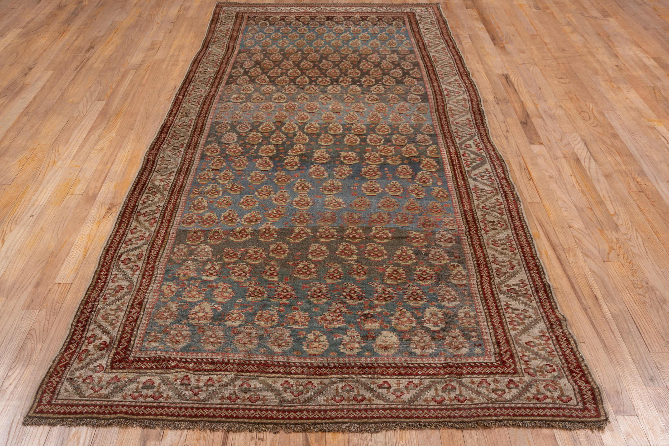 4' x 10' one-of-a-kind handmade antique Malayer runner rug. Color palette: blue, ivory, rust, brown, taupe, terracotta
