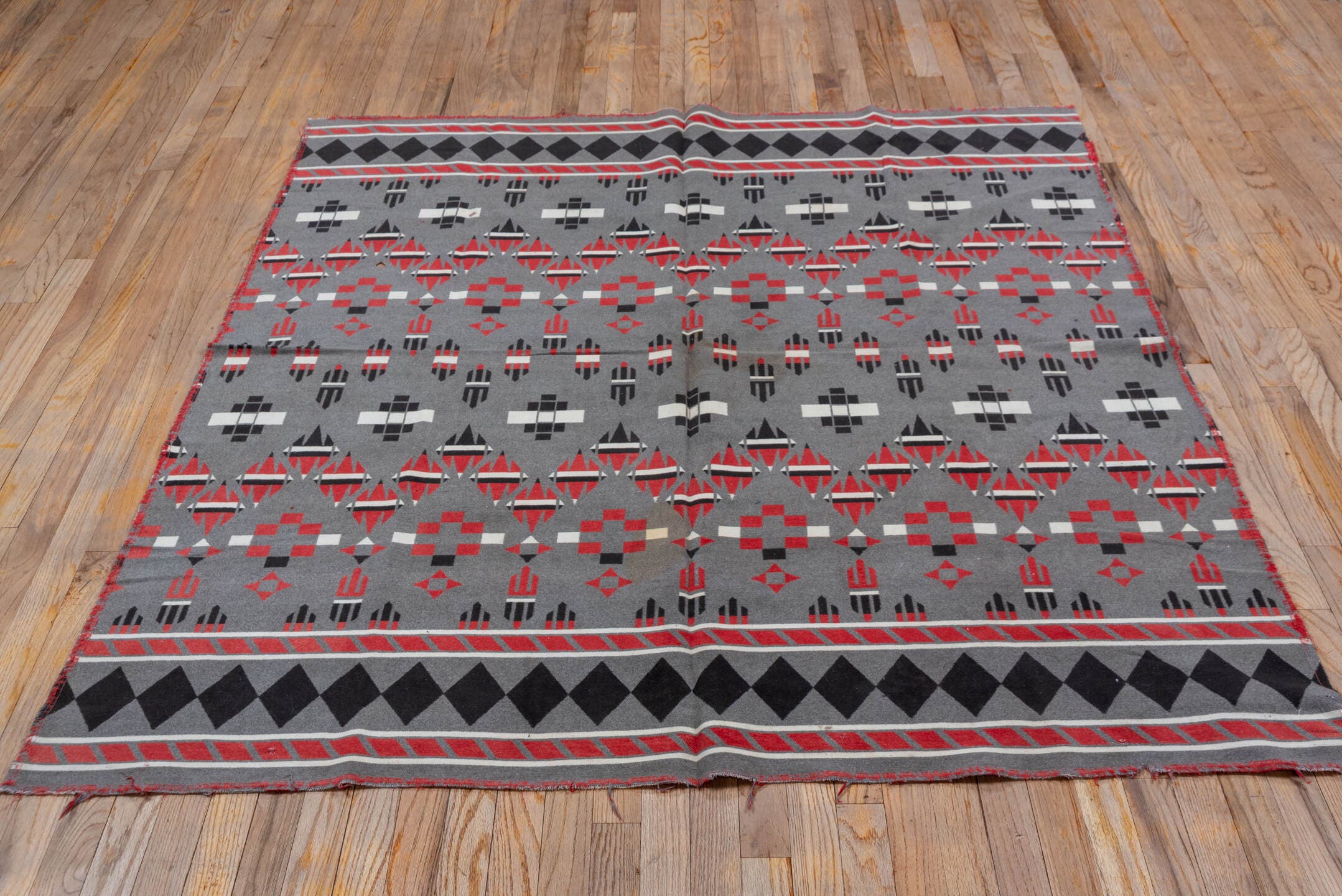 5' x 6' one-of-a-kind handmade vintage Blanket rug. Color palette: gray, charcoal, crimson, ivory, taupe, black, red, beige