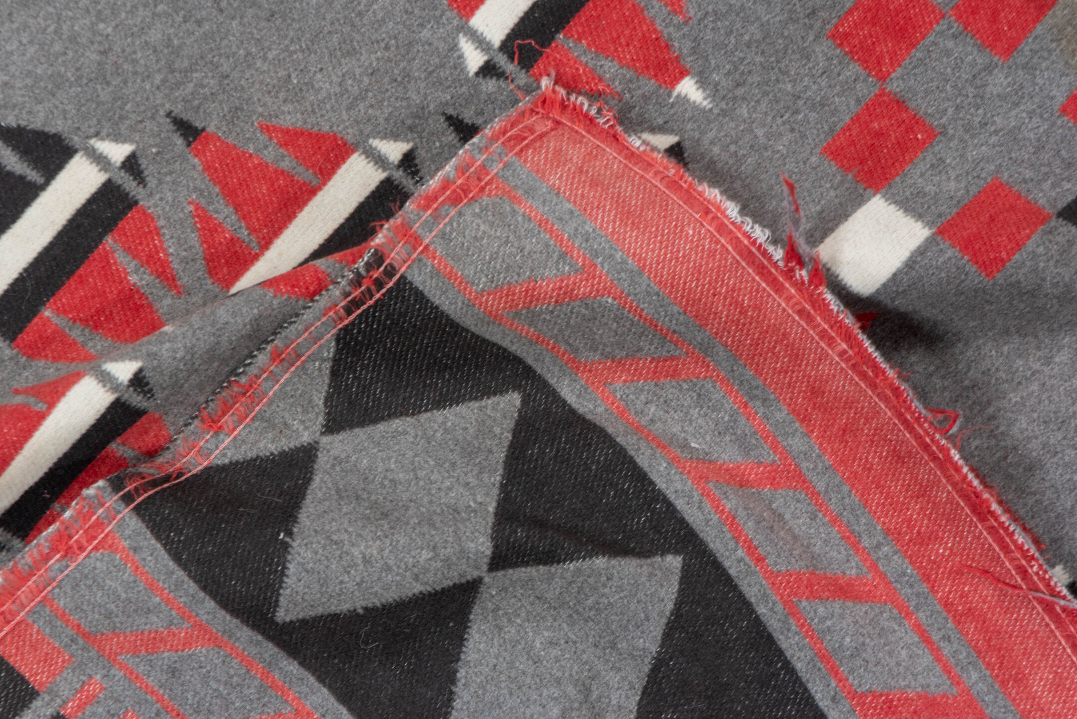 5' x 6' one-of-a-kind handmade vintage Blanket rug. Color palette: gray, charcoal, crimson, ivory, taupe, black, red, beige