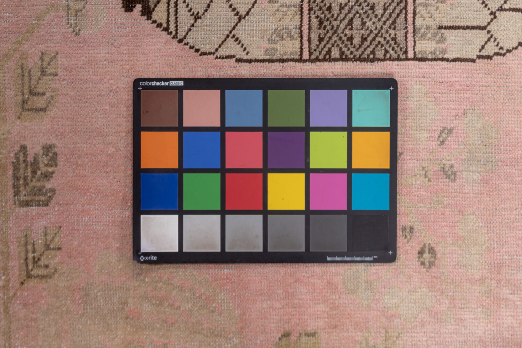 4' x 7' one-of-a-kind handmade vintage Khotan rug. Color palette: brown, gray, light gray, off-white, pink, snow, white