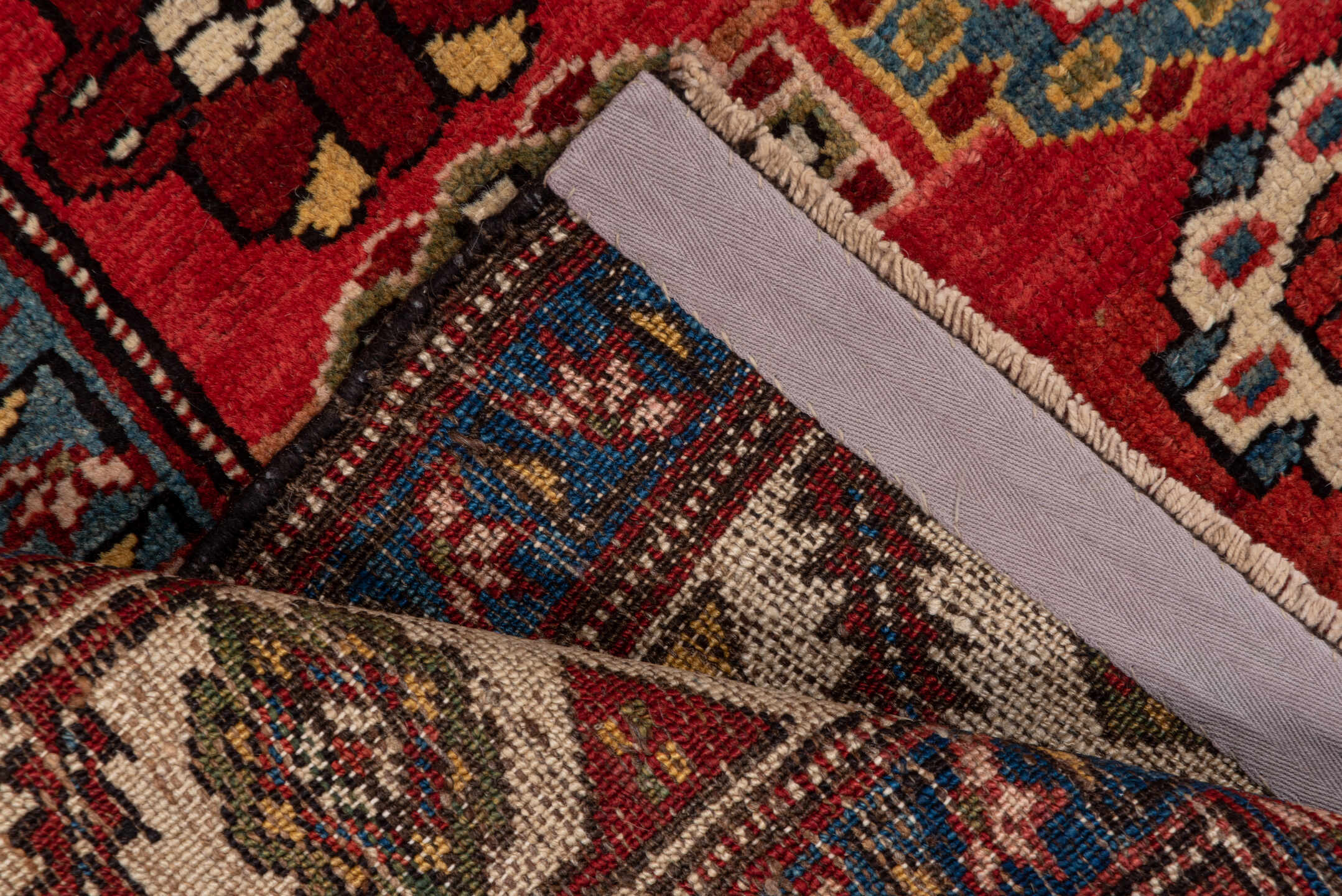 4' x 5' one-of-a-kind handmade antique NW Persian small size rug. Color palette: red, ivory, blue, burgundy, gold, camel