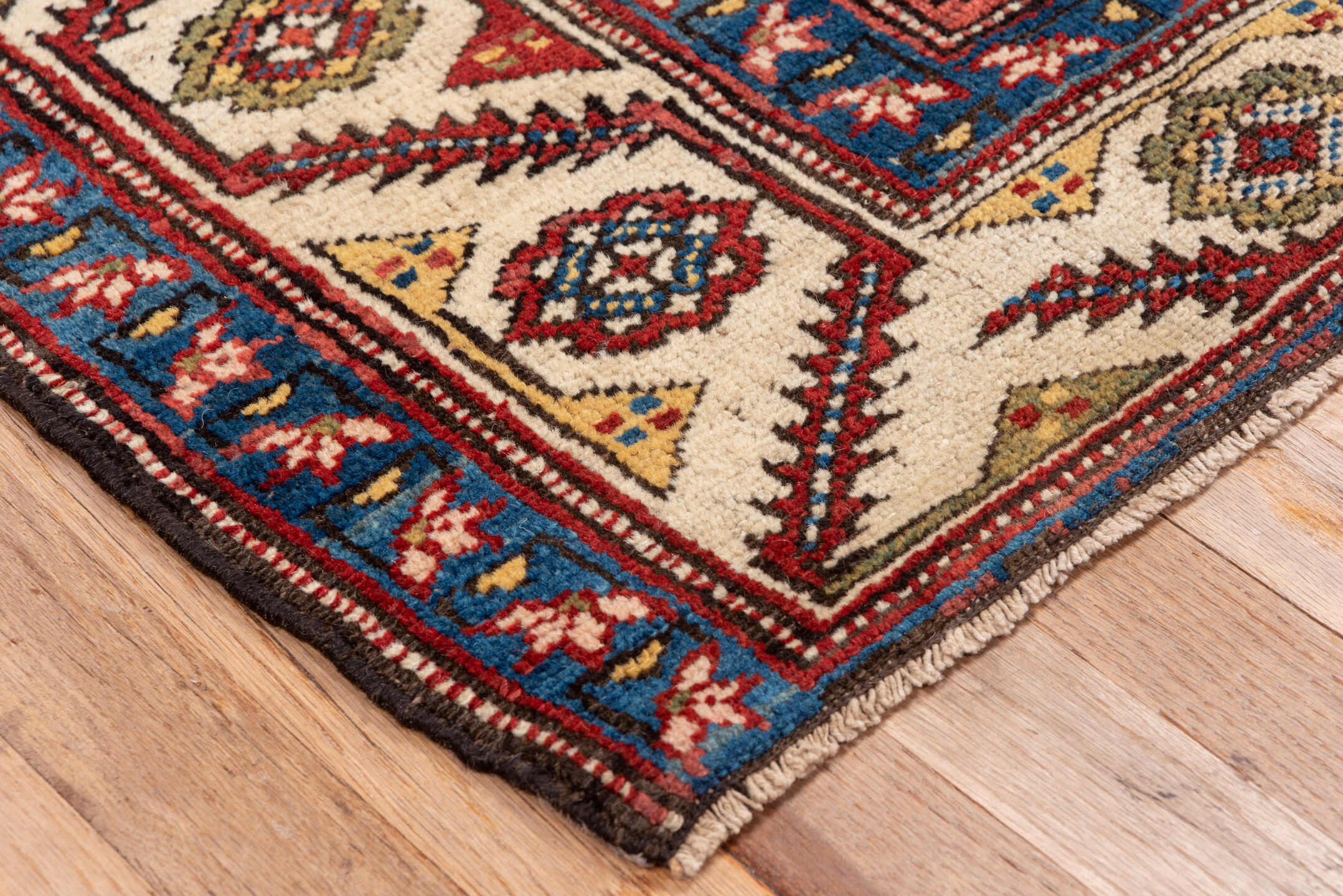 4' x 5' one-of-a-kind handmade antique NW Persian small size rug. Color palette: red, ivory, blue, burgundy, gold, camel