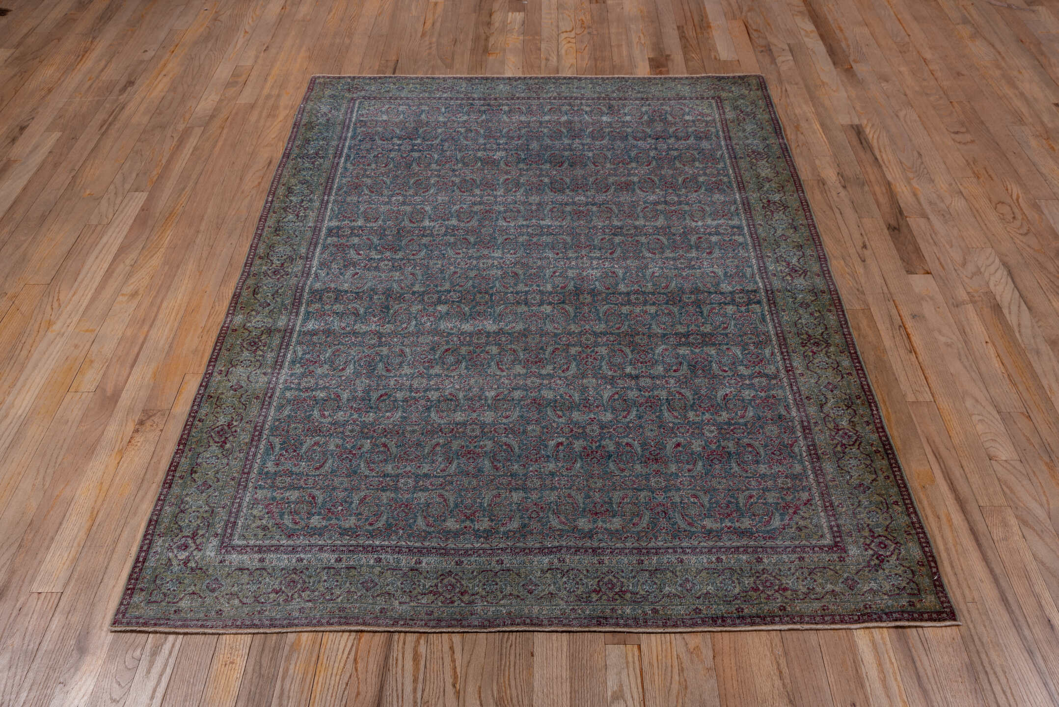 4' x 6' one-of-a-kind handmade antique Tabriz small size rug. Color palette: blue, sage, burgundy, ivory, taupe, rose