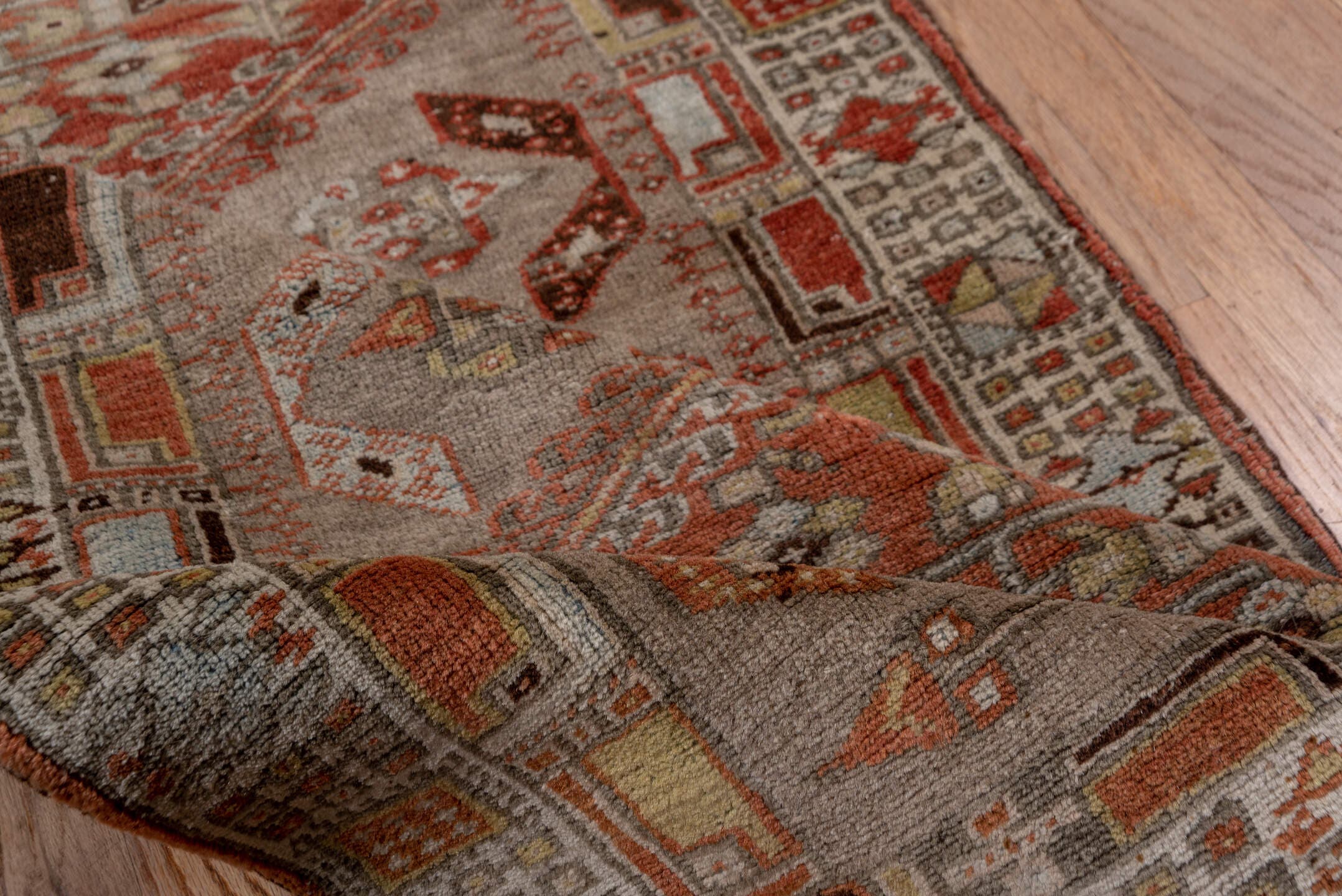 2' x 10' one-of-a-kind handmade antique Sarab runner rug. Color palette: taupe, rust, ivory, brown, pale blue, camel, beige