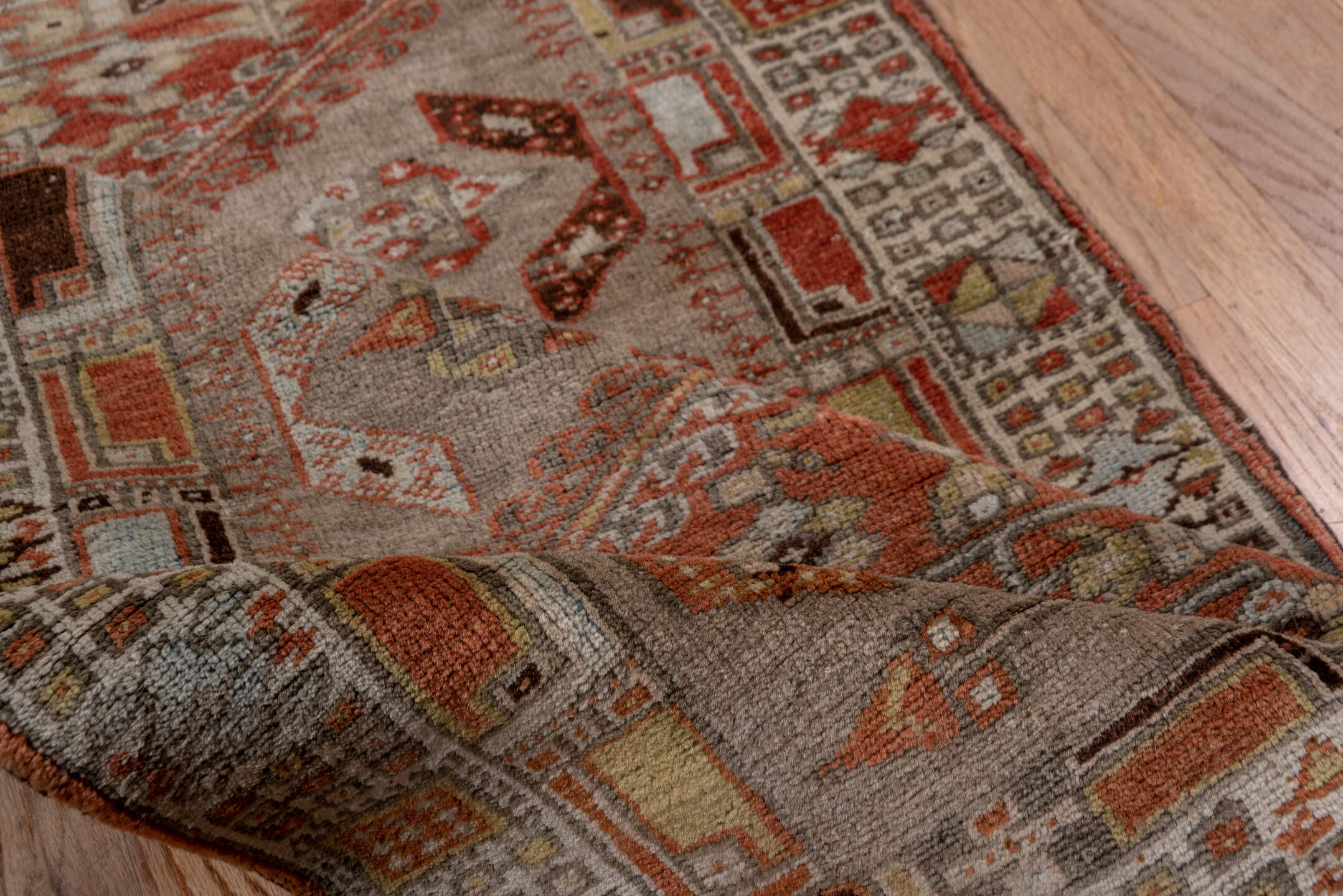 2' x 10' one-of-a-kind handmade antique Sarab runner rug. Color palette: taupe, rust, ivory, brown, pale blue, camel, beige