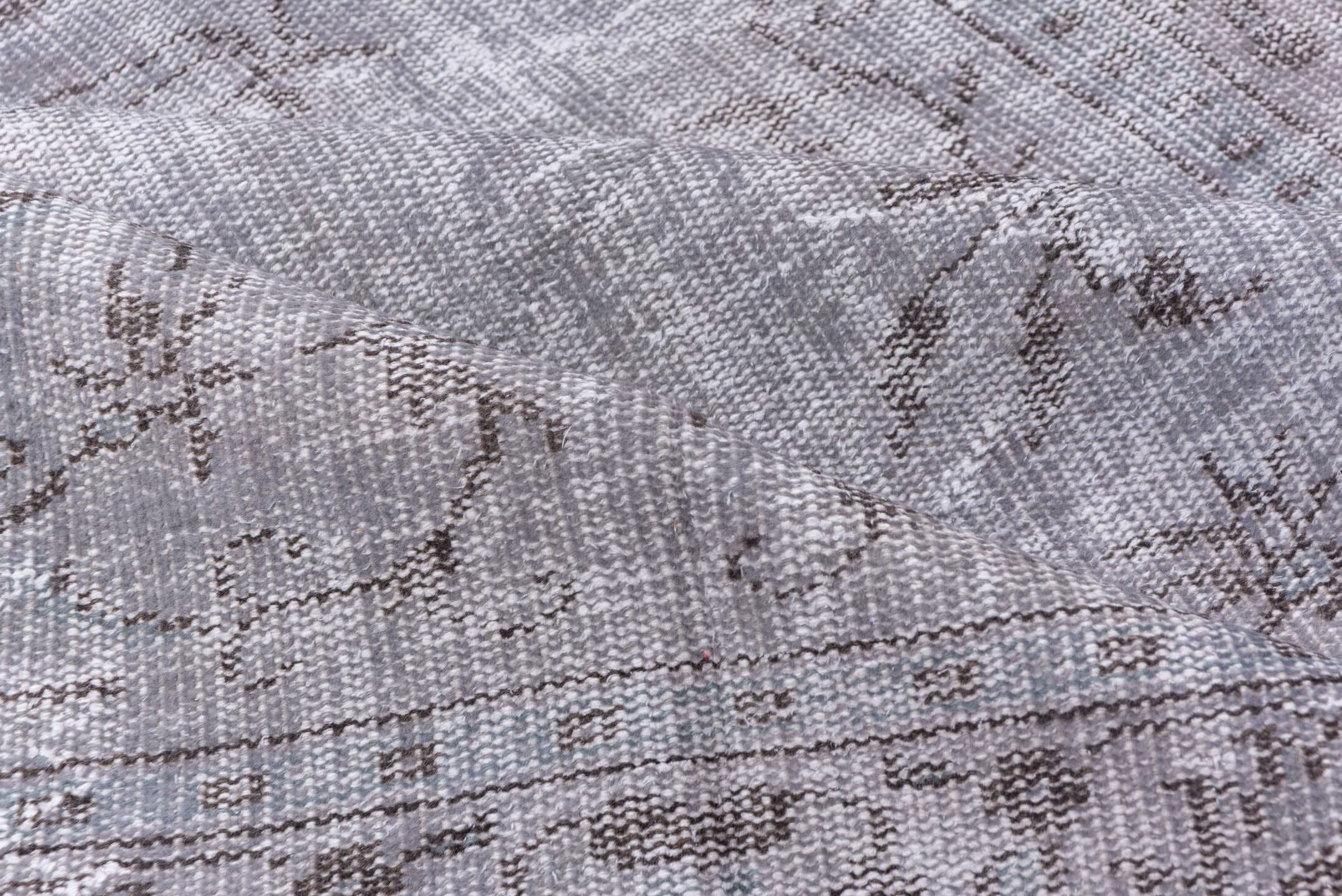5' x 9' one-of-a-kind handmade vintage Overdyed medium size rug. Color palette: gray, taupe, charcoal, ivory, beige, black