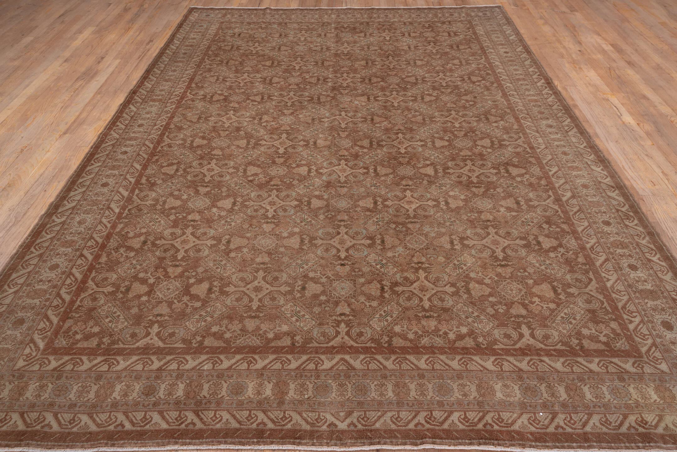 8' x 11' one-of-a-kind handmade antique Sivas large size rug. Color palette: terra cotta, camel, ivory, taupe, rose, sienna