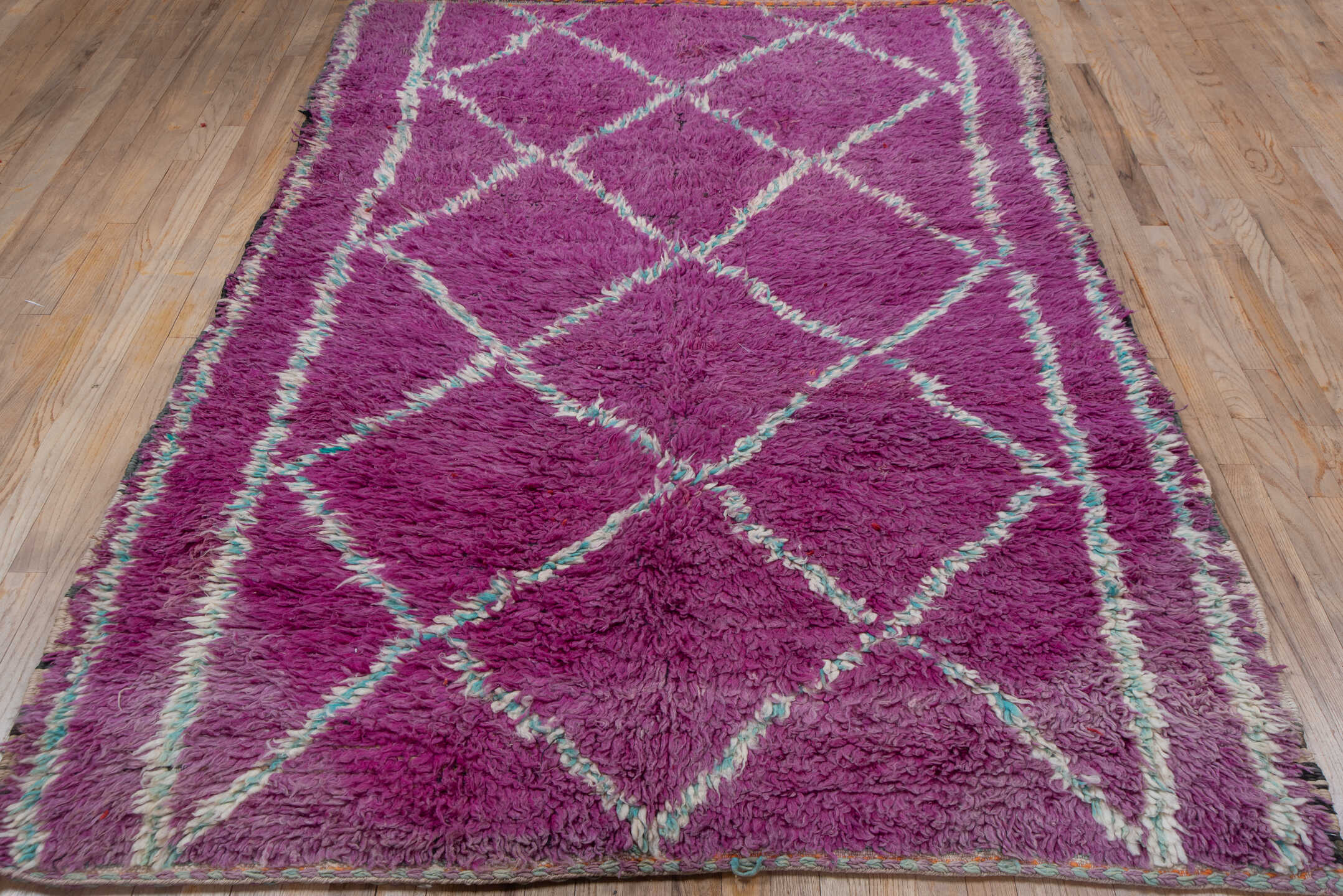 5' x 8' one-of-a-kind handmade vintage Moroccan medium size rug. Color palette: magenta, ivory, aqua, plum, rose, pink, teal