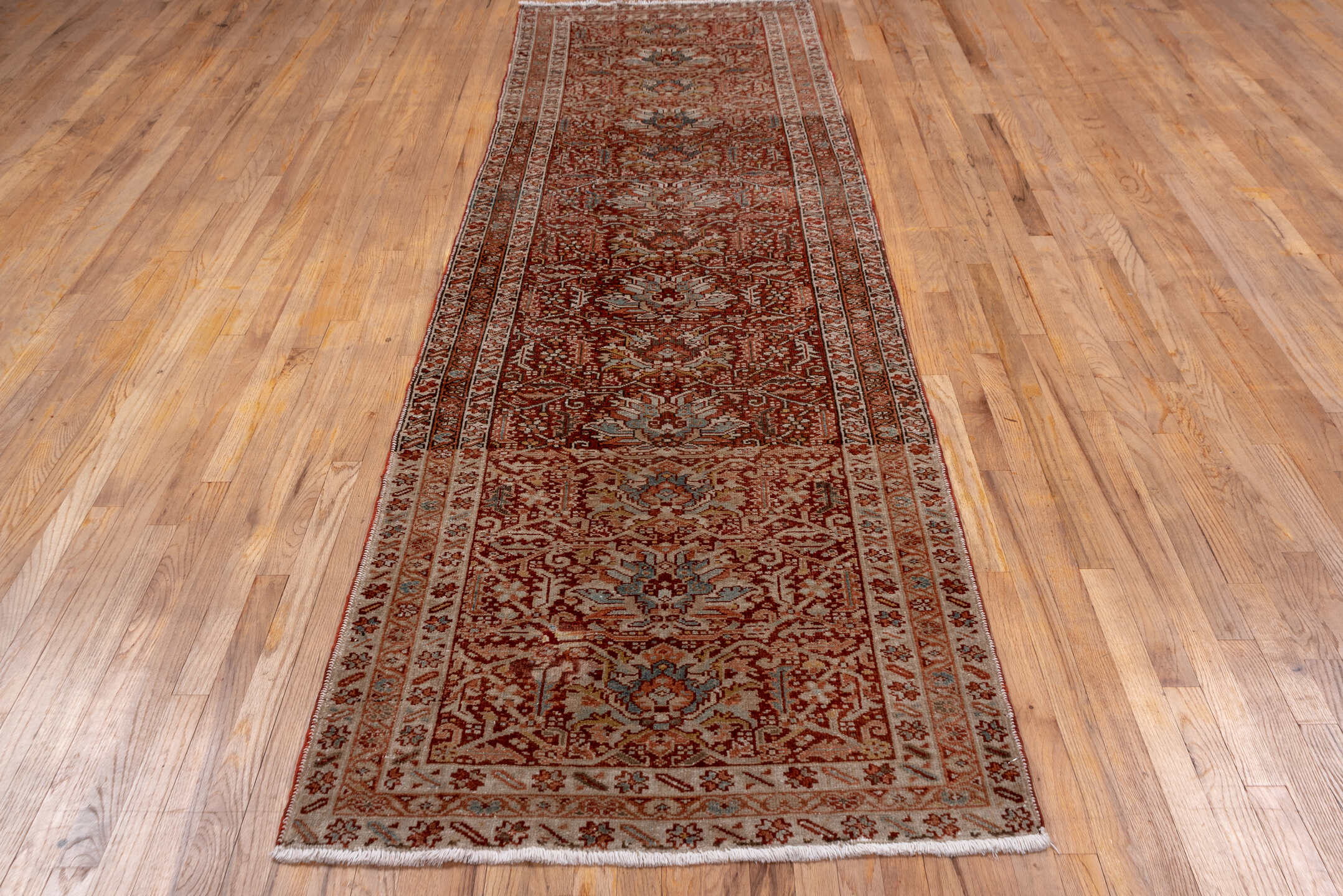 3' x 11' one-of-a-kind handmade antique Karaje runner rug. Color palette: rust, ivory, terra cotta, camel, brown, slate blue