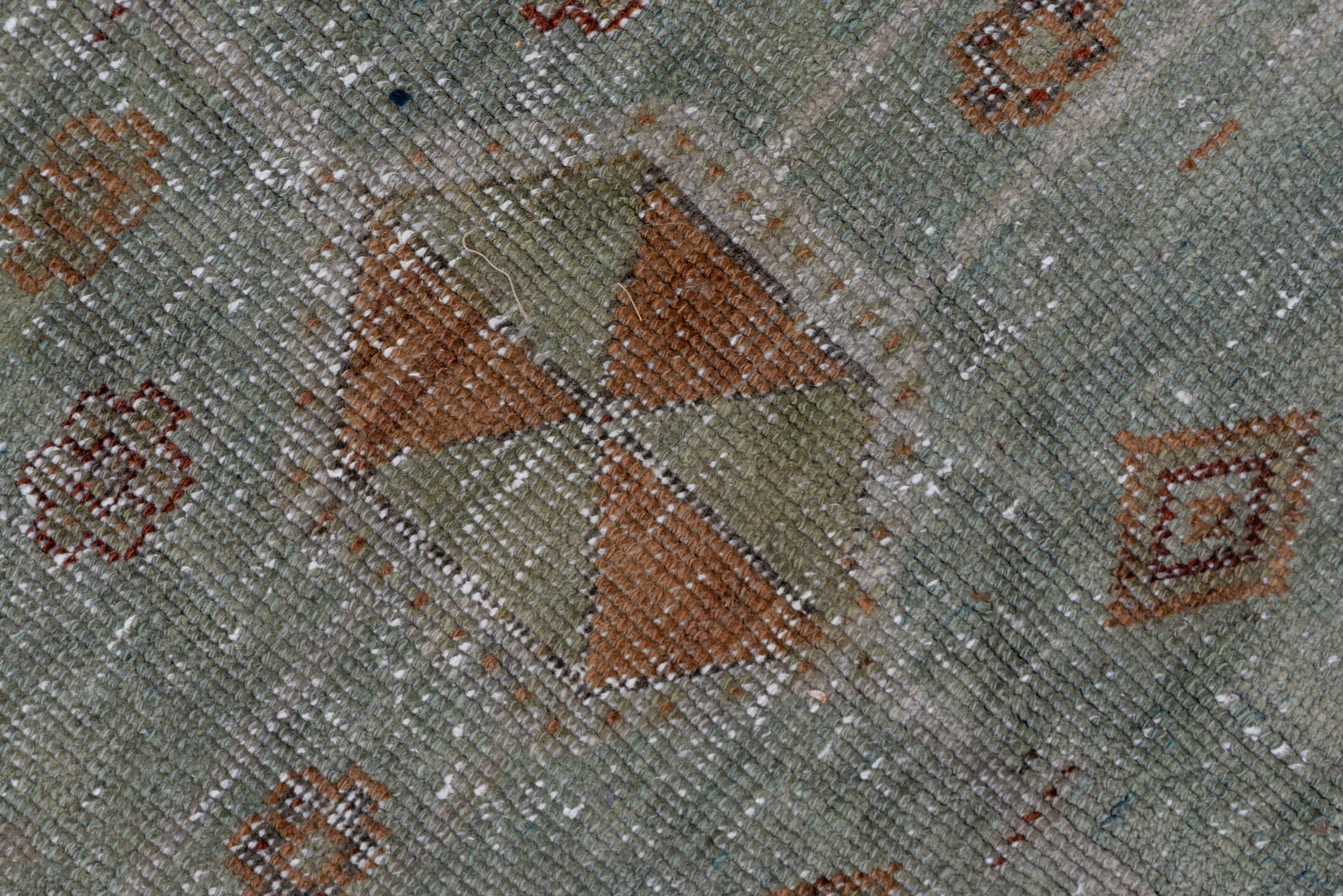 4' x 8' one-of-a-kind handmade vintage Trans Caucasian rug. Color palette: rust, sage, taupe, ivory, terra cotta, brown