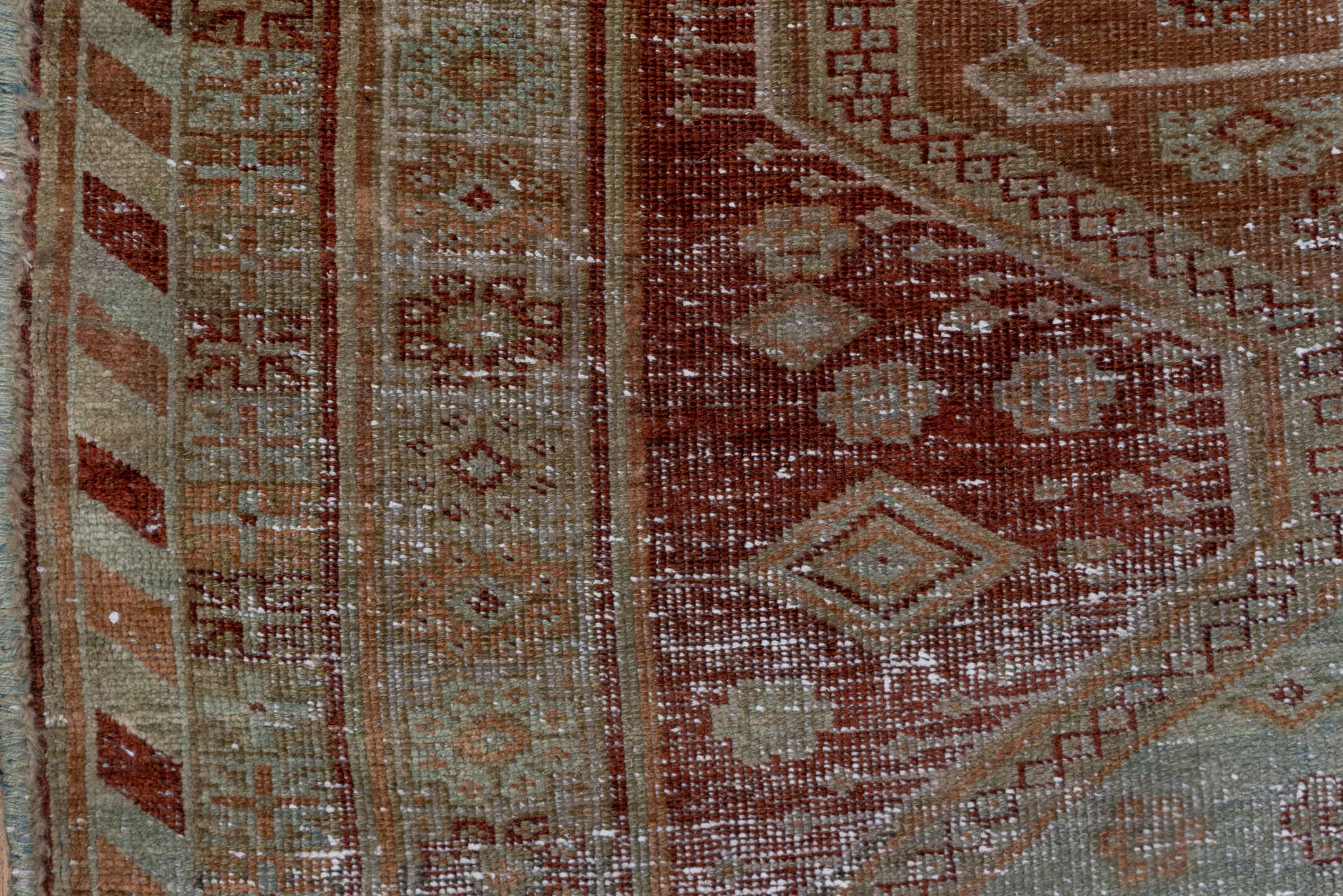 4' x 8' one-of-a-kind handmade vintage Trans Caucasian rug. Color palette: rust, sage, taupe, ivory, terra cotta, brown