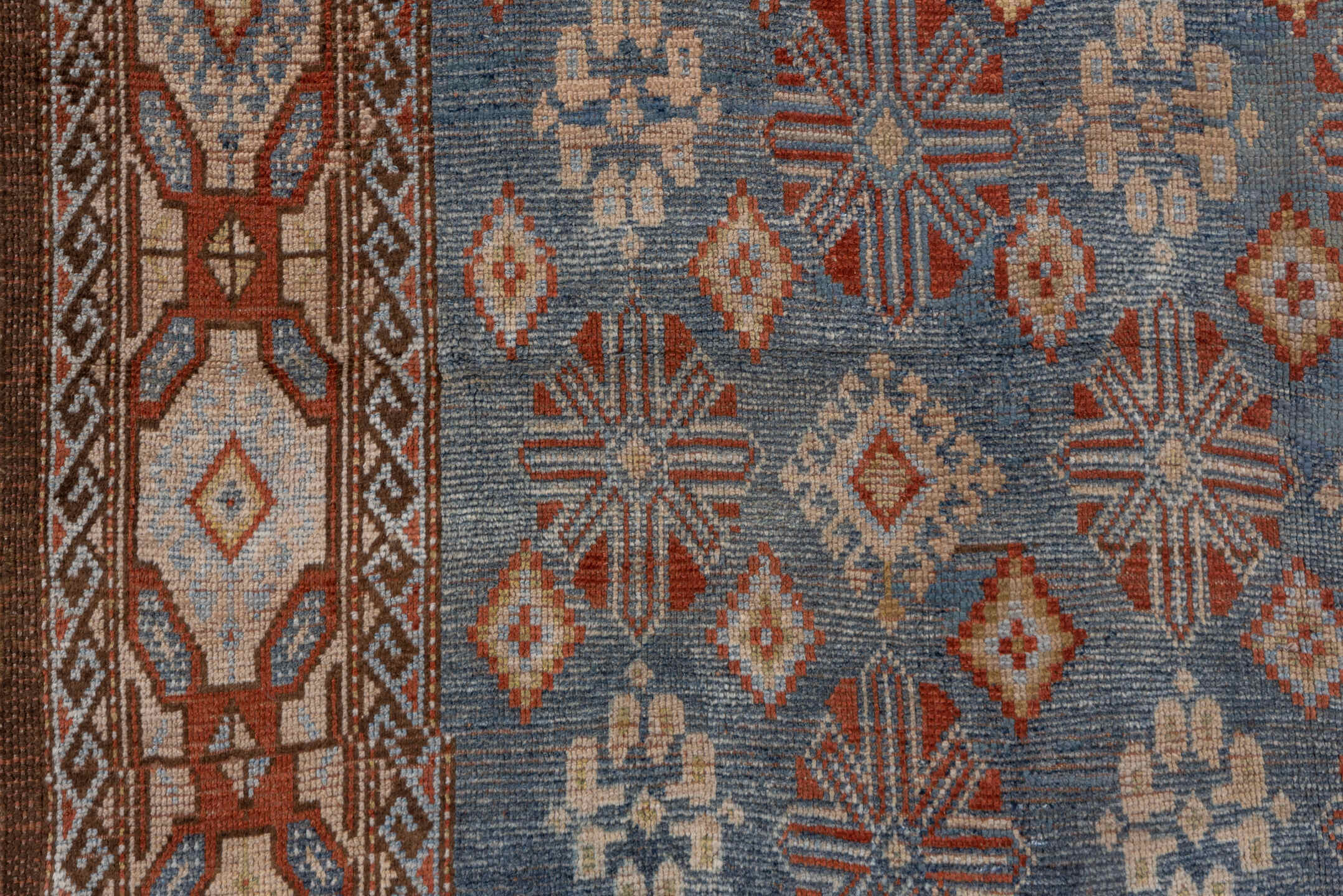 4' x 9' one-of-a-kind handmade antique Caucasian runner rug. Color palette: blue, ivory, rust, taupe, slate, camel