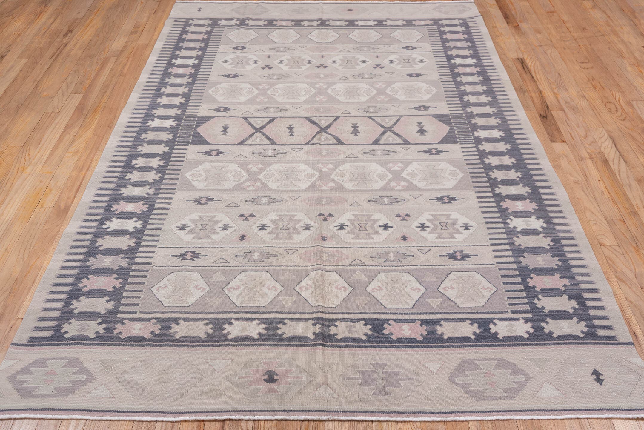 5' x 8' one-of-a-kind handmade antique Kilim medium size rug. Color palette: ivory, taupe, charcoal, blush, beige, soft pink