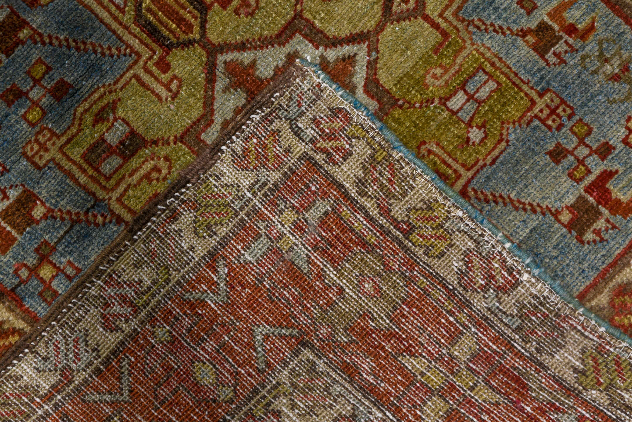 3' x 18' one-of-a-kind handmade antique Heriz runner rug. Color palette: rust, sky blue, ivory, brick, taupe, brown, slate