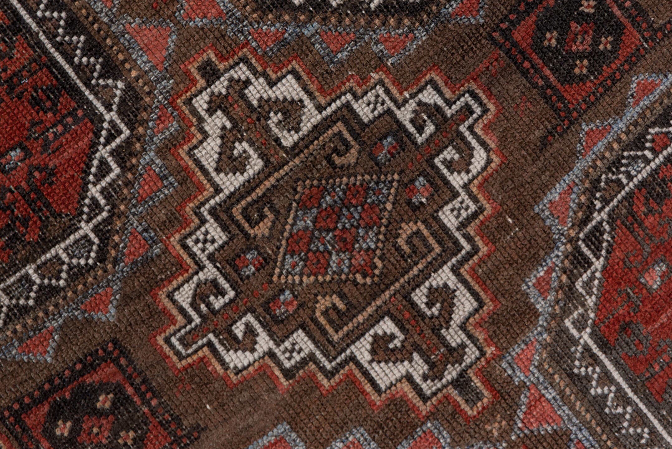 3' x 6' one-of-a-kind handmade vintage Belouch small size rug. Color palette: rust, brown, mahogany, ivory, charcoal, taupe