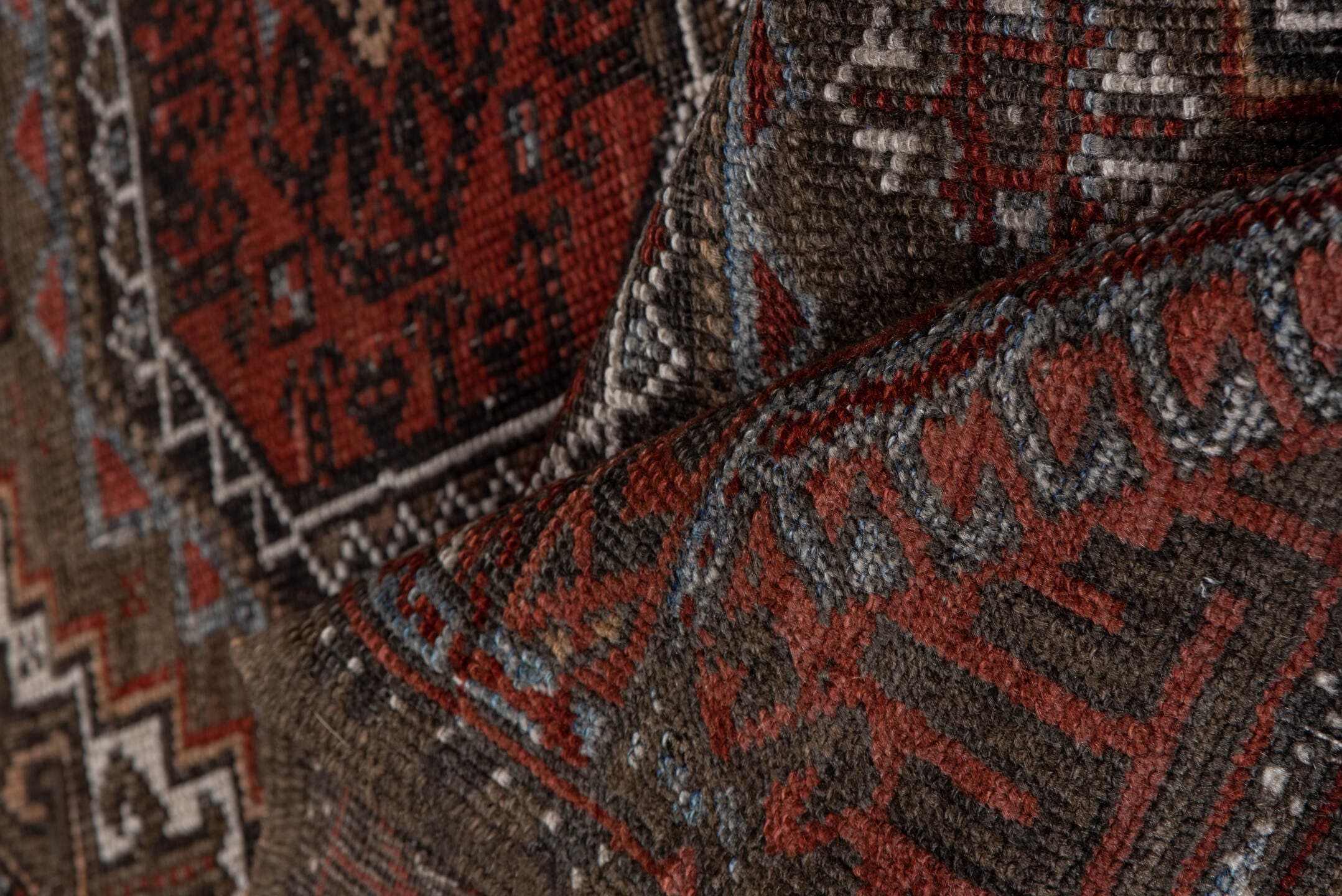 3' x 6' one-of-a-kind handmade vintage Belouch small size rug. Color palette: rust, brown, mahogany, ivory, charcoal, taupe