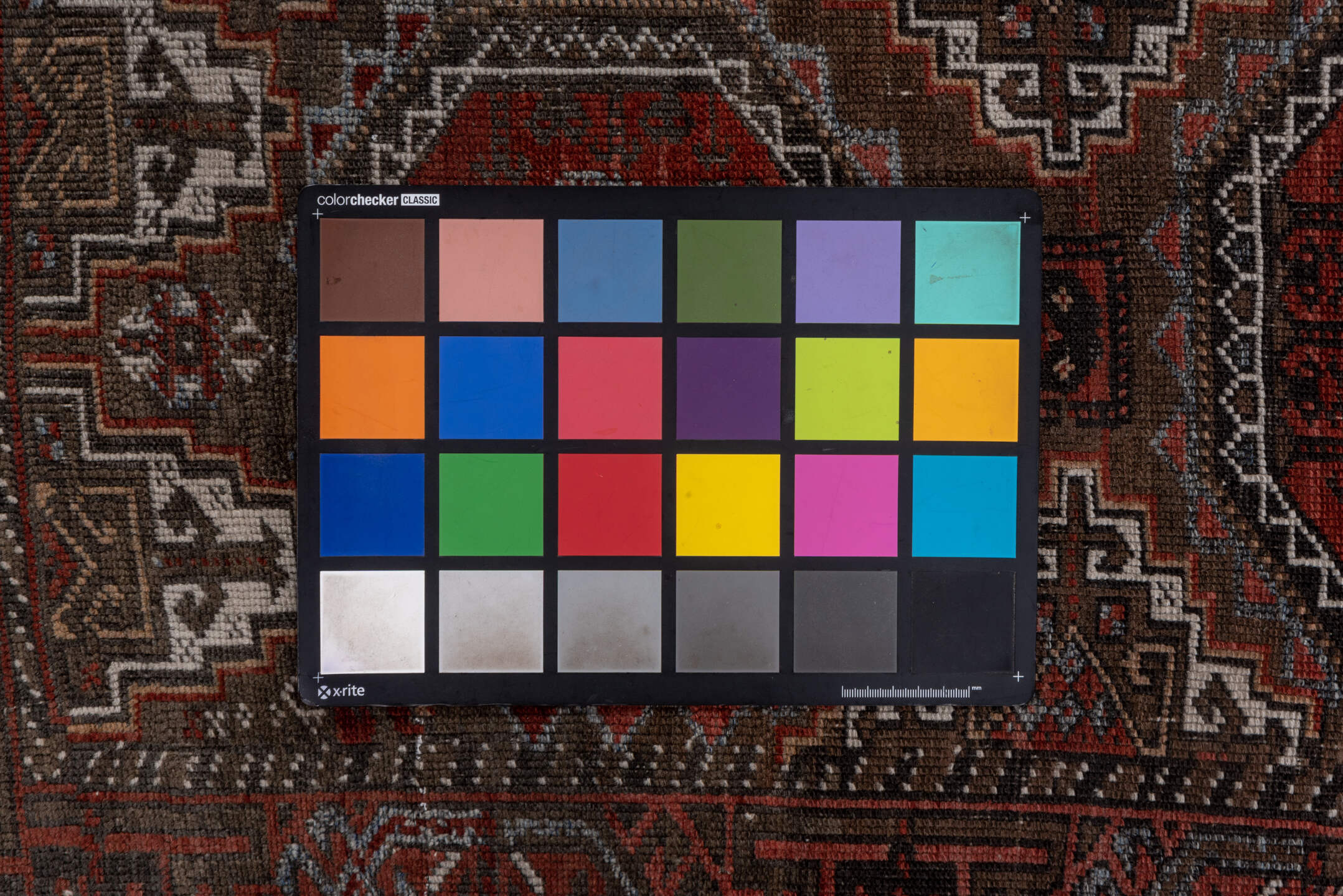 3' x 6' one-of-a-kind handmade vintage Belouch small size rug. Color palette: brown, gray, pink, red, redwood