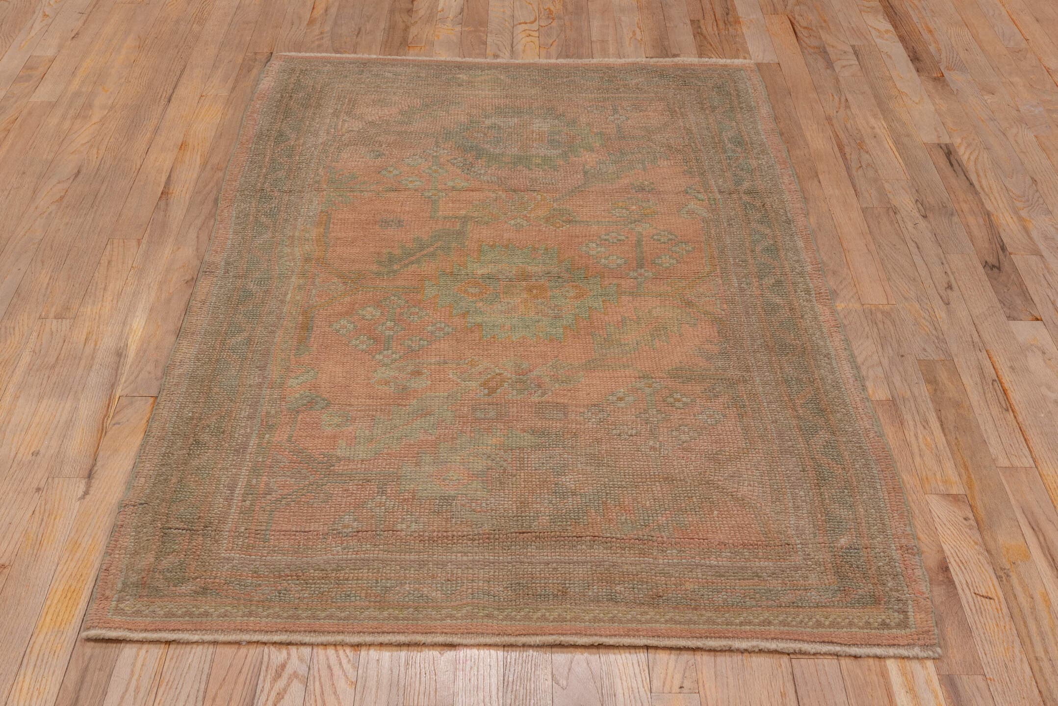 3' x 6' one-of-a-kind handmade antique Oushak small size rug. Color palette: rose, taupe, sage, ivory, ochre, terra cotta