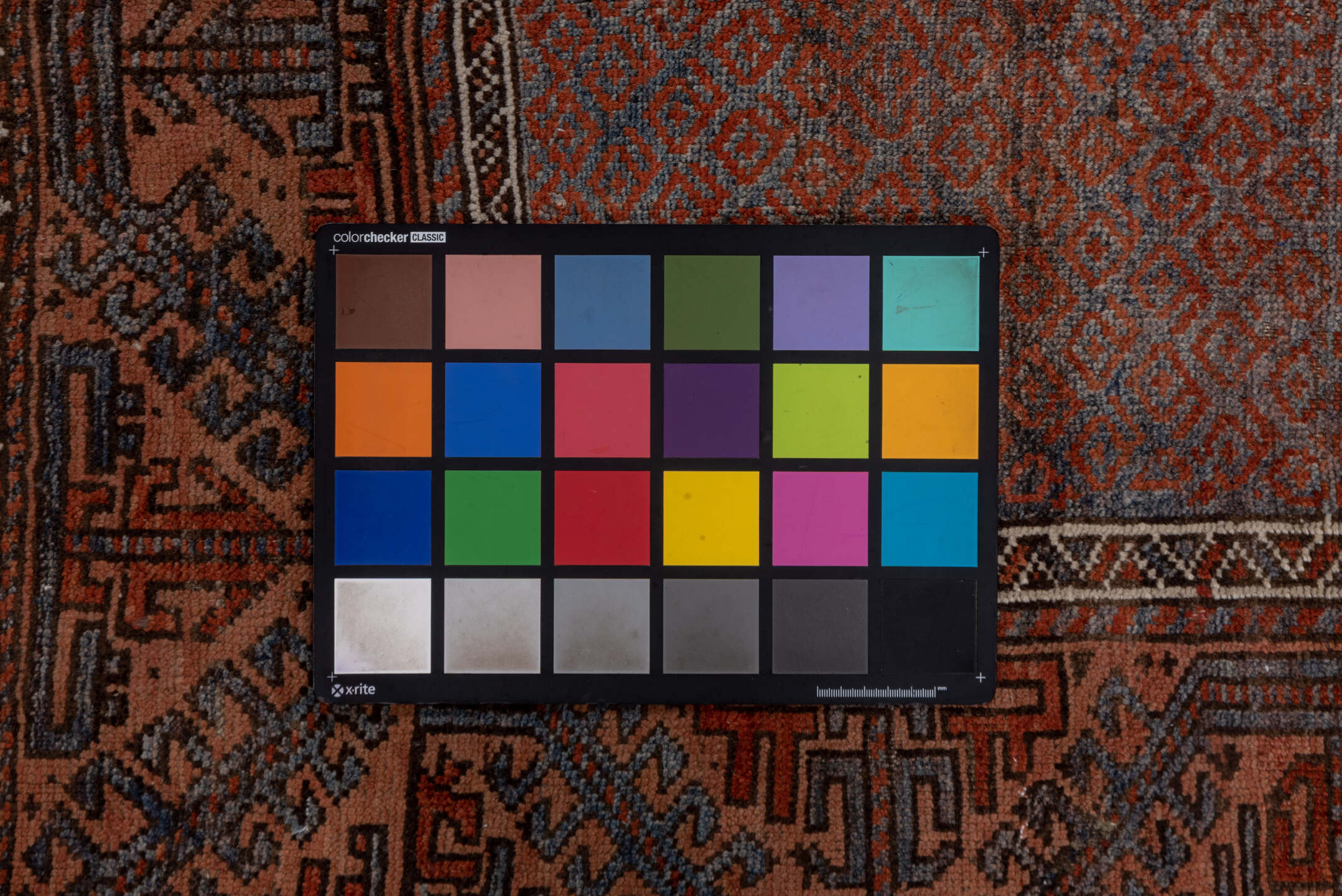 3' x 6' one-of-a-kind handmade vintage Belouch small size rug. Color palette: brown, gray, light gray, pink, red, redwood