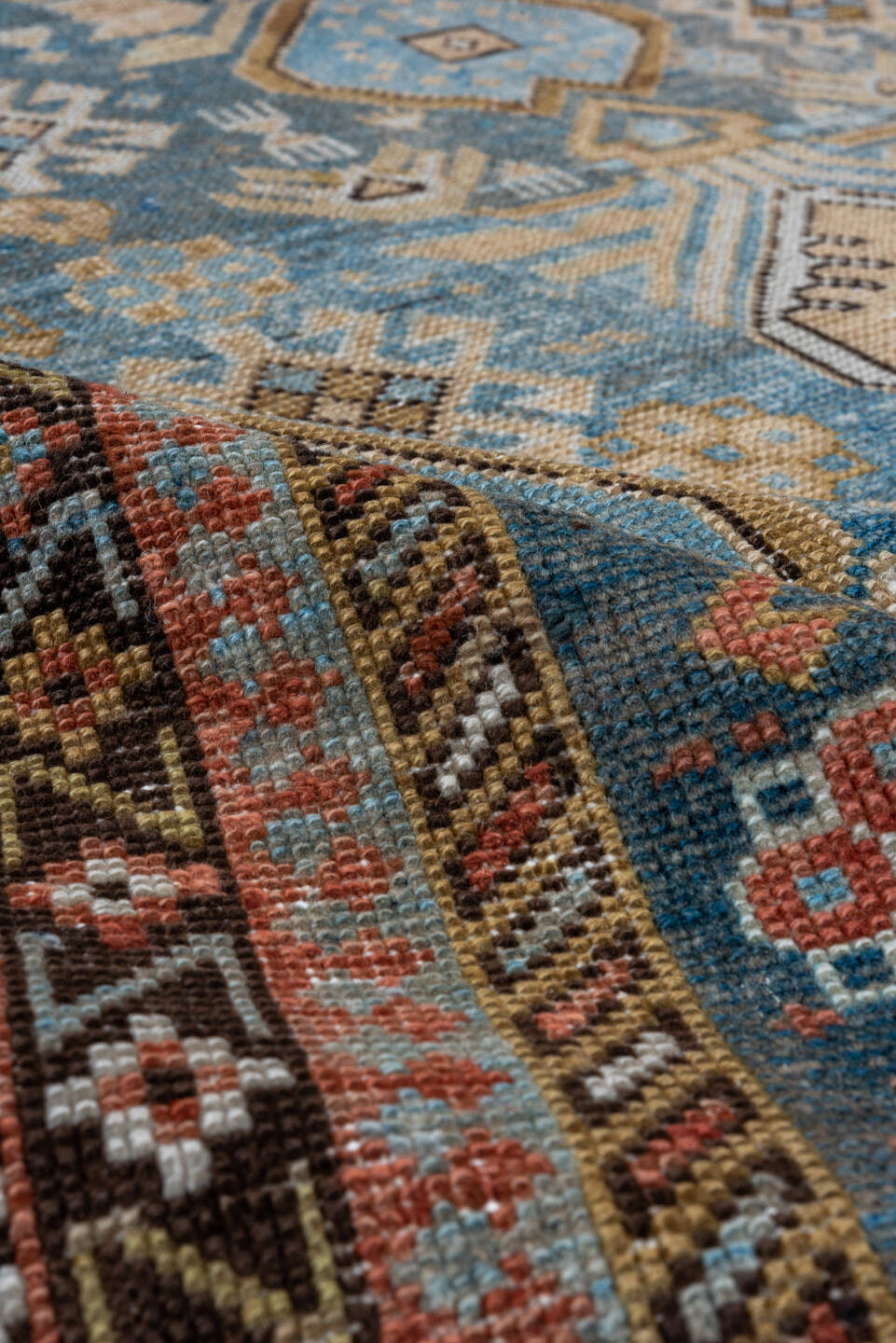 4' x 4' one-of-a-kind handmade antique Shirvan small size rug. Color palette: light blue, ivory, rust, brown, camel, navy