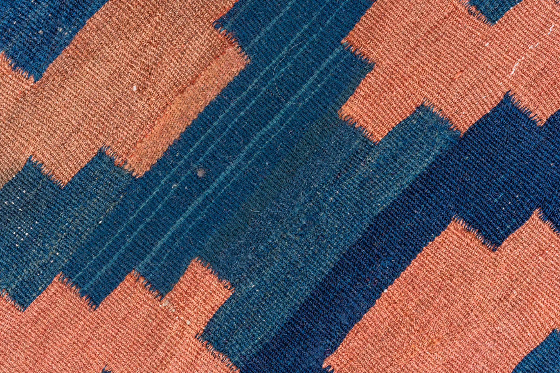 4' x 10' one-of-a-kind handmade vintage Kilim runner rug. Color palette: blue, brown, gray, off-white, orange, pink, red