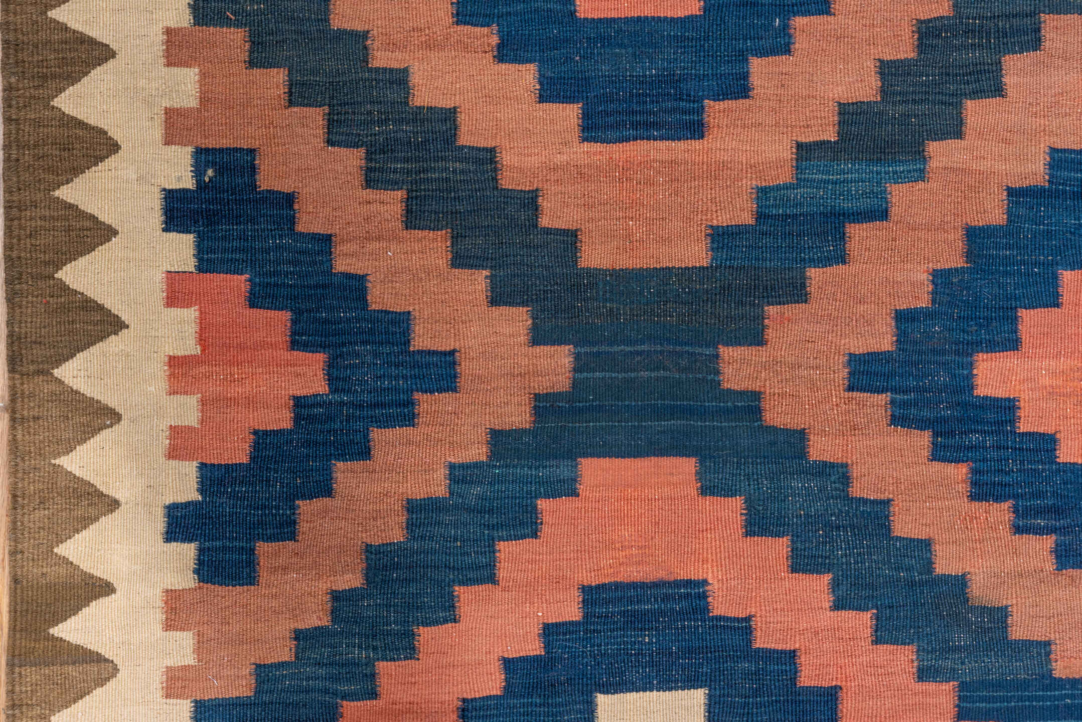 4' x 10' one-of-a-kind handmade vintage Kilim runner rug. Color palette: blue, brown, gray, off-white, orange, pink, red