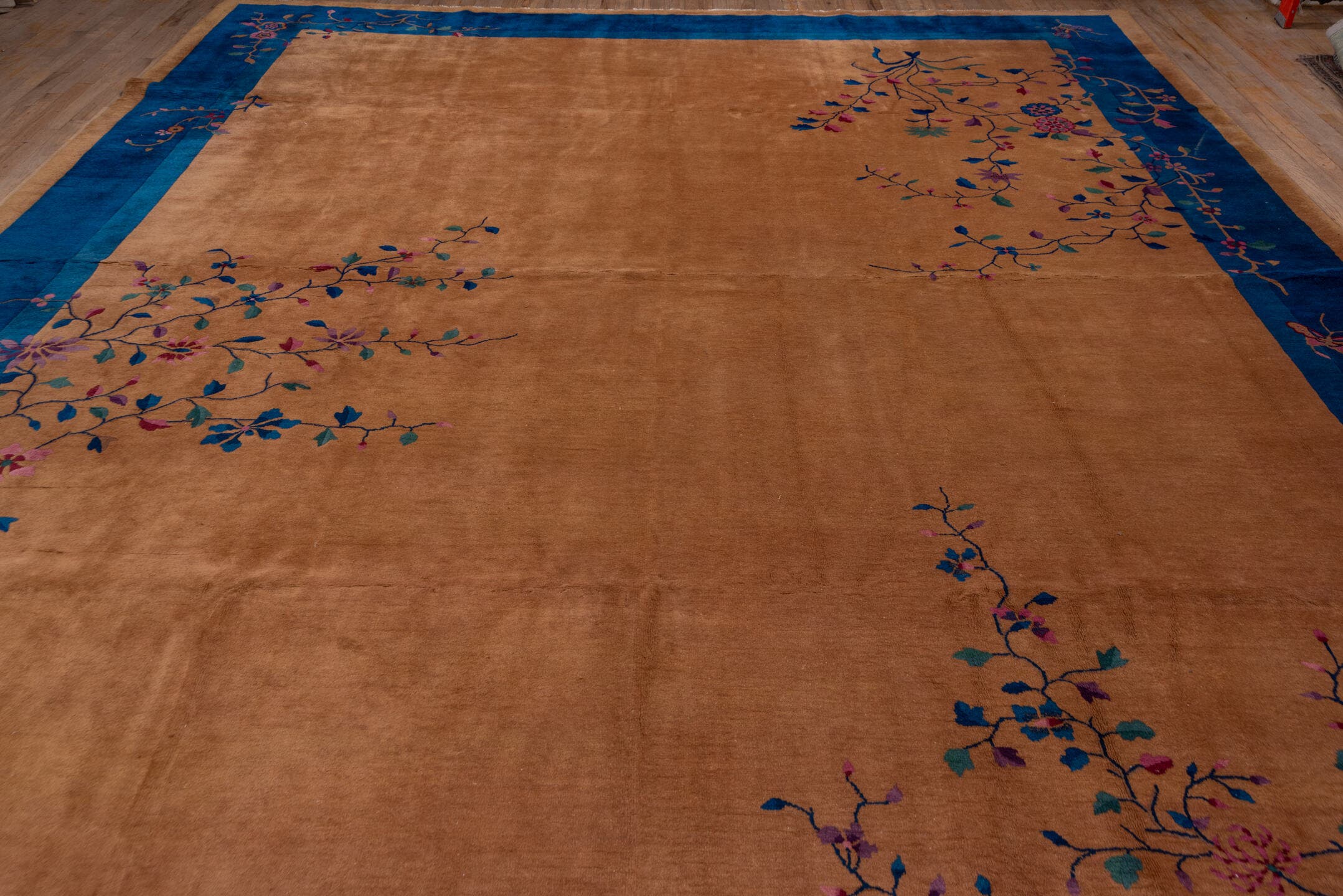 12' x 15' one-of-a-kind handmade antique Chinese oversize rug. Color palette: camel, cobalt, tan, rose, teal, violet