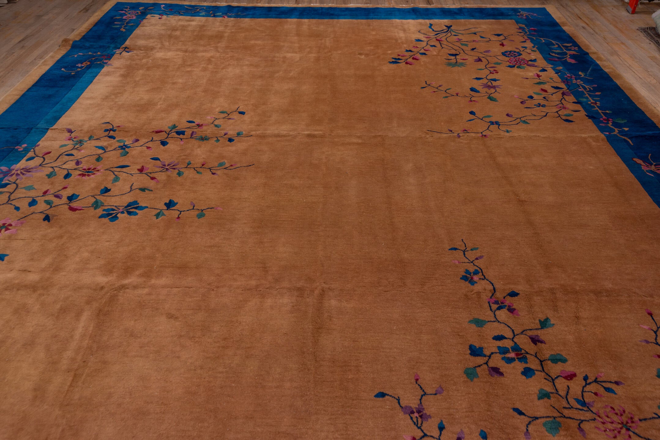 12' x 15' one-of-a-kind handmade antique Chinese oversize rug. Color palette: camel, cobalt, tan, rose, teal, violet