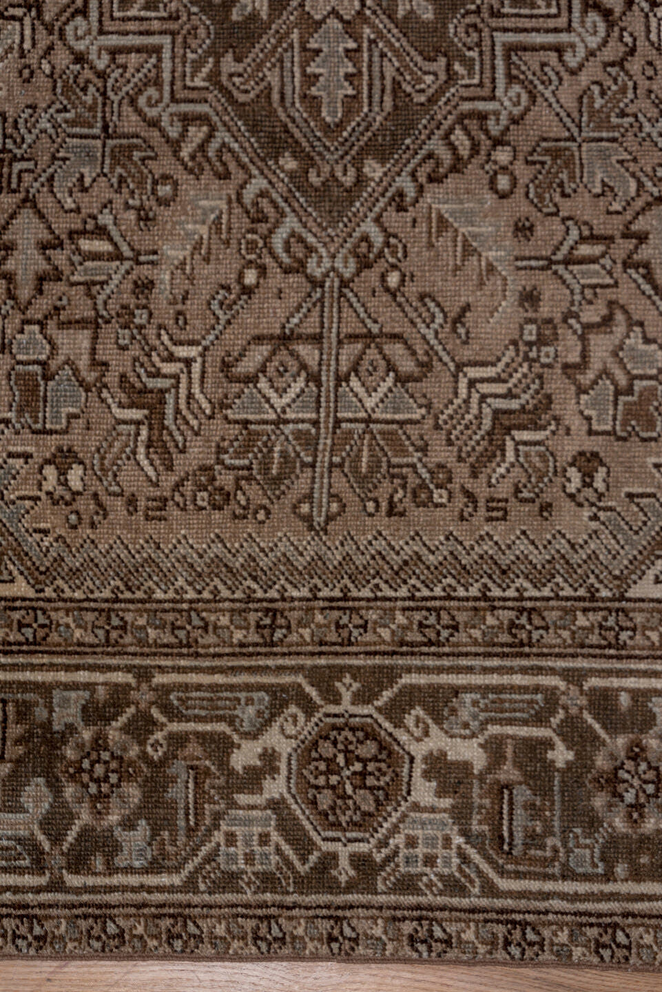 7' x 9' one-of-a-kind handmade vintage Heriz rug. Color palette: taupe, brown, ivory, charcoal, camel, greige, beige, gray