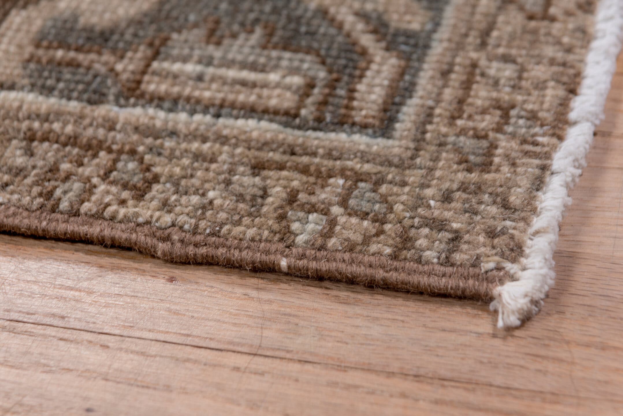 7' x 9' one-of-a-kind handmade vintage Heriz rug. Color palette: taupe, brown, ivory, charcoal, camel, greige, beige, gray