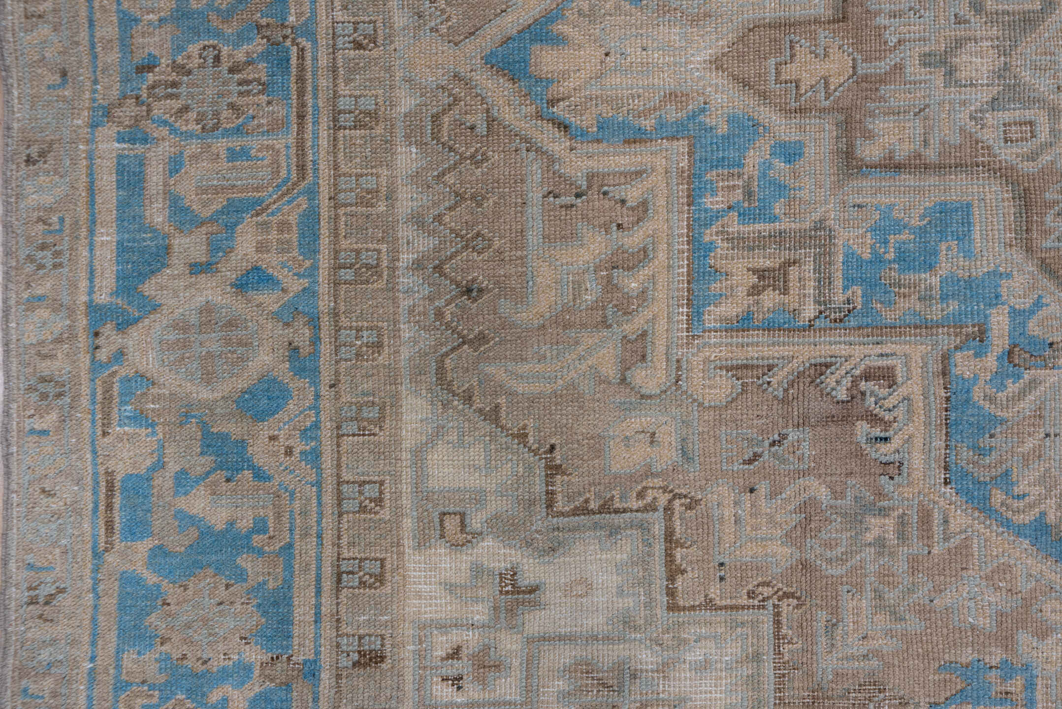 6' x 9' one-of-a-kind handmade antique Heriz medium size rug. Color palette: ivory, taupe, sky blue, beige, camel
