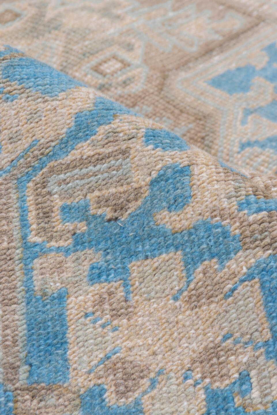 6' x 9' one-of-a-kind handmade antique Heriz medium size rug. Color palette: ivory, taupe, sky blue, beige, camel