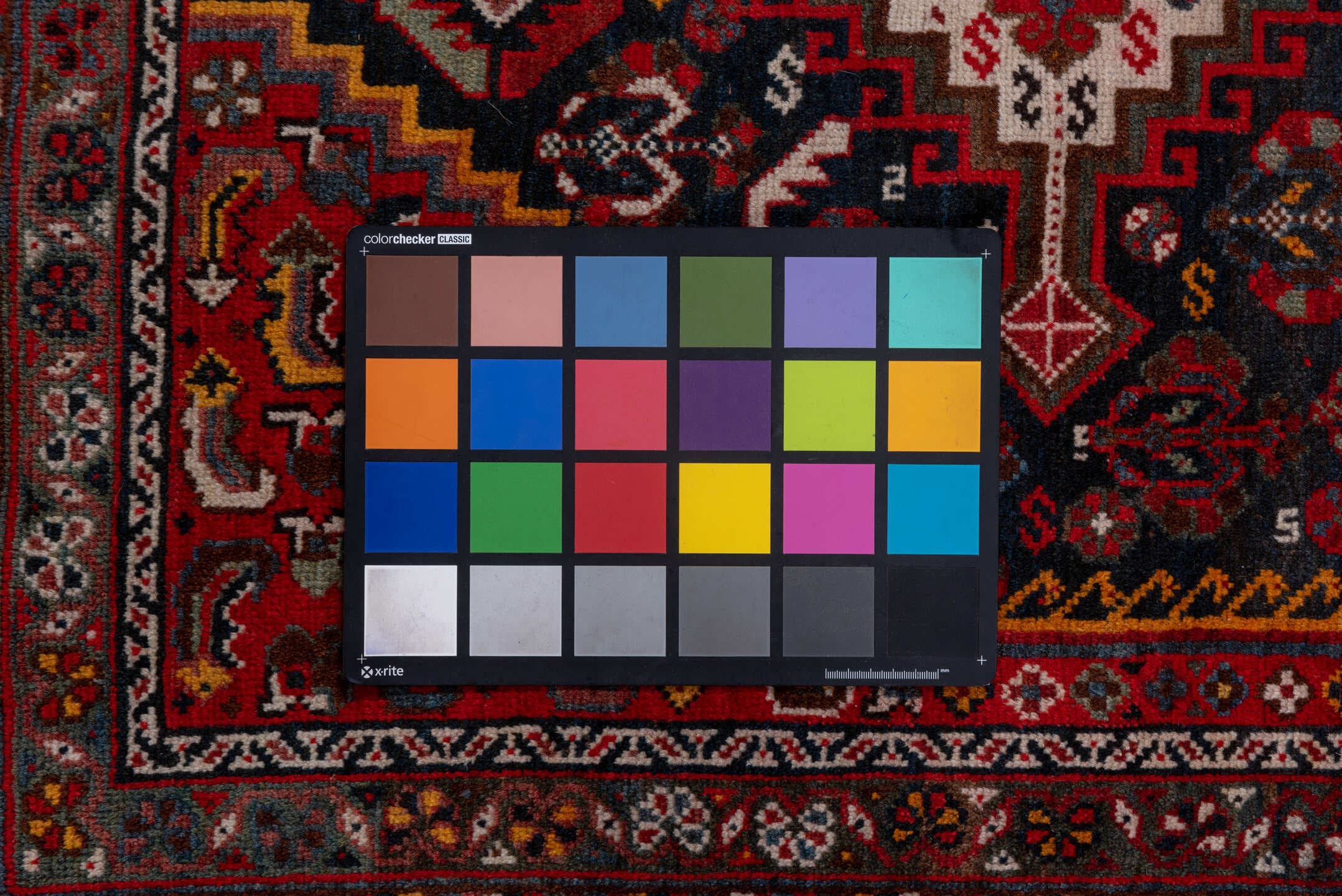 5' x 8' one-of-a-kind handmade antique Shiraz medium size rug. Color palette: red, navy, ivory, rust, burgundy, slate, gold