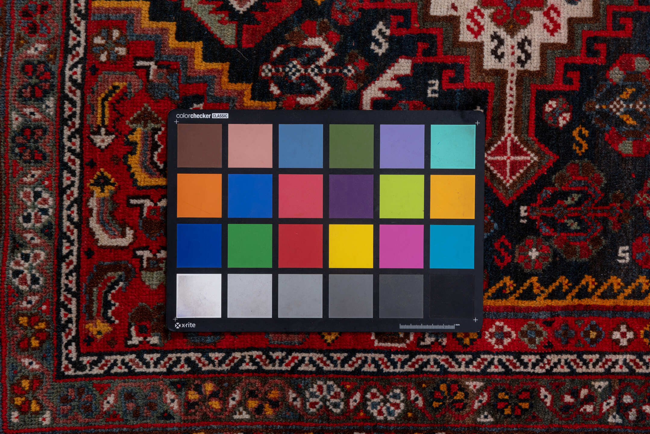 5' x 8' one-of-a-kind handmade vintage Shiraz medium size rug. Color palette: black, blue, brown, burgundy, gray, light gray