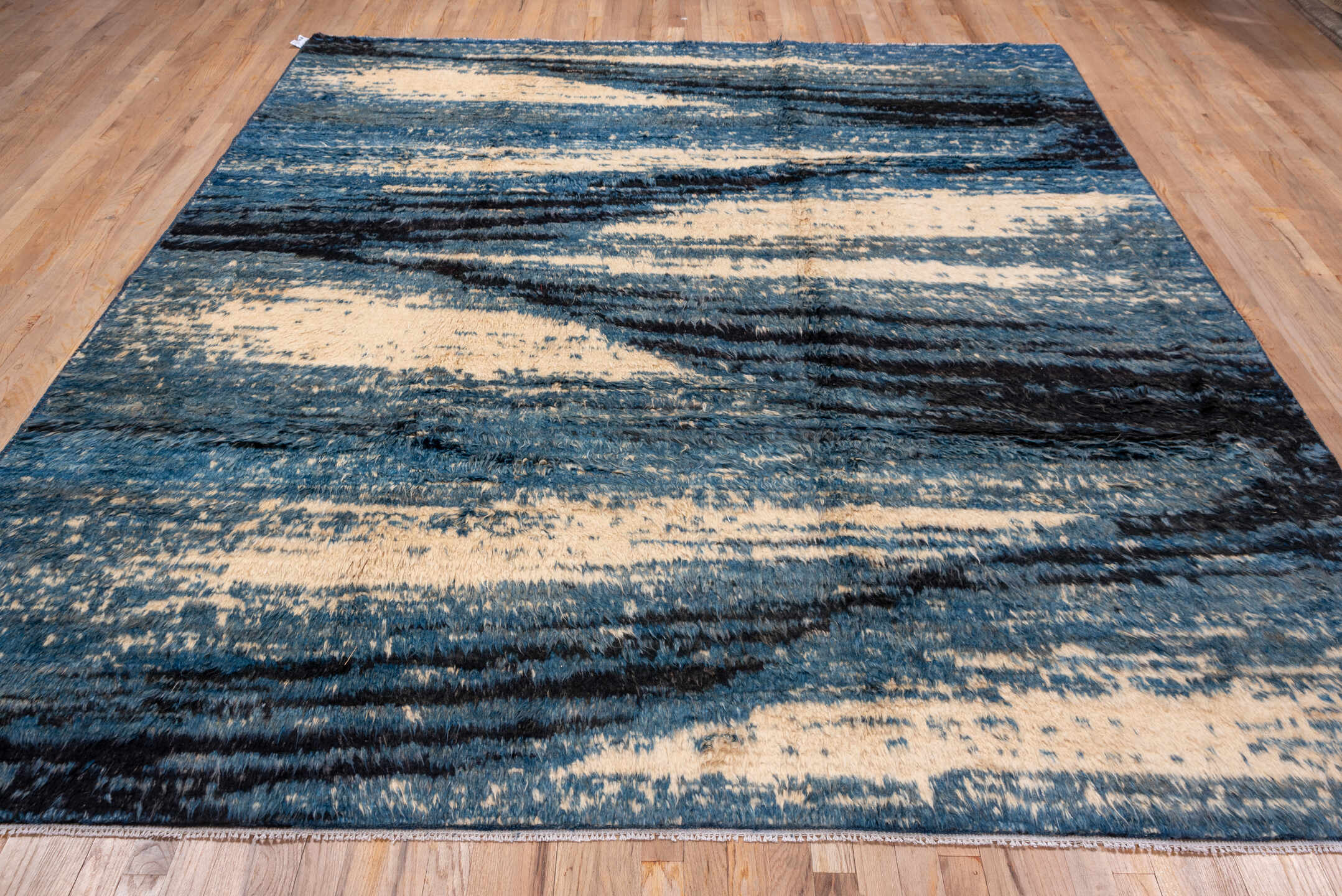 8' x 9' one-of-a-kind handmade vintage Moroccan rug. Color palette: blue, ivory, navy, charcoal, gray, black
