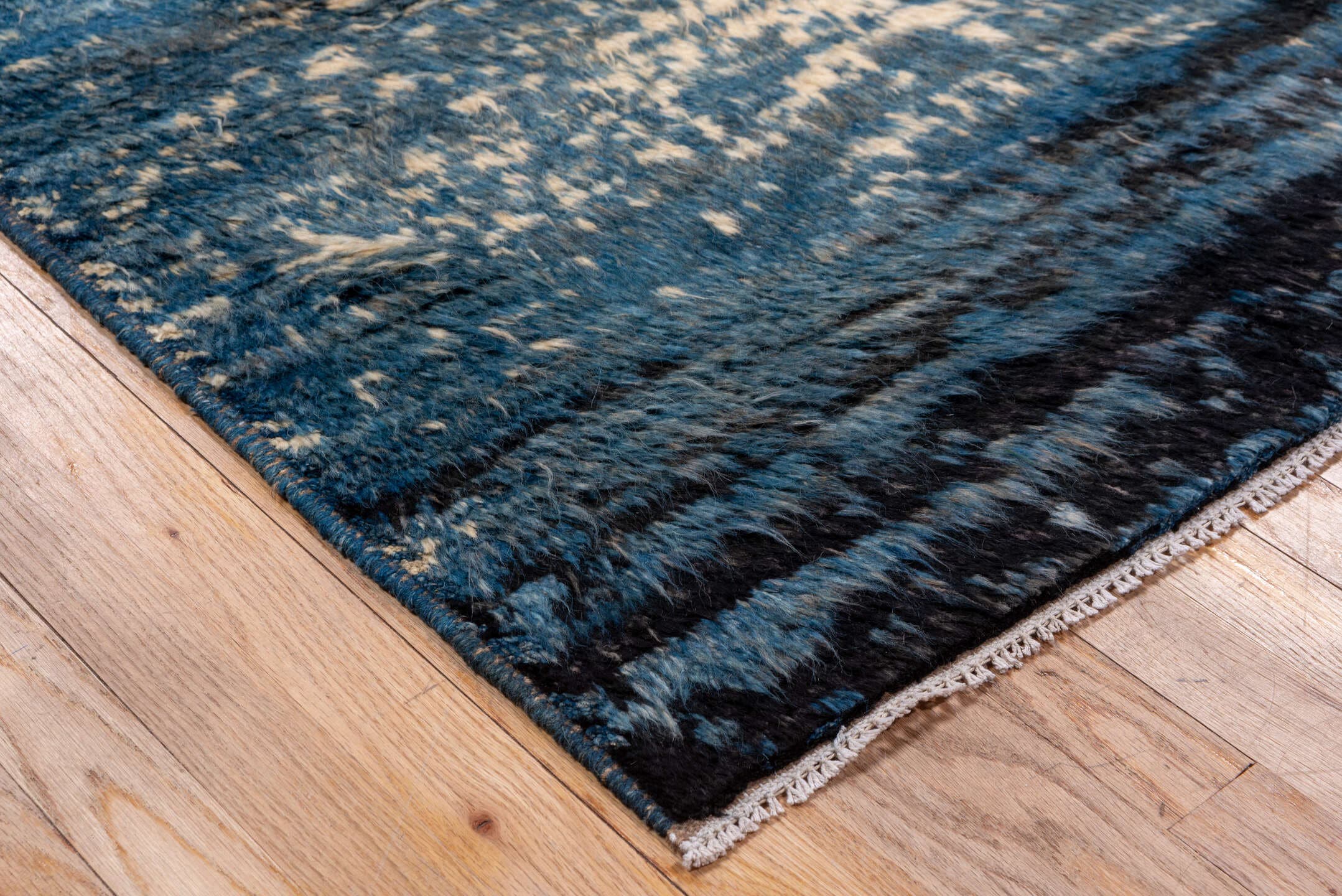 8' x 9' one-of-a-kind handmade vintage Moroccan rug. Color palette: blue, ivory, navy, charcoal, gray, black