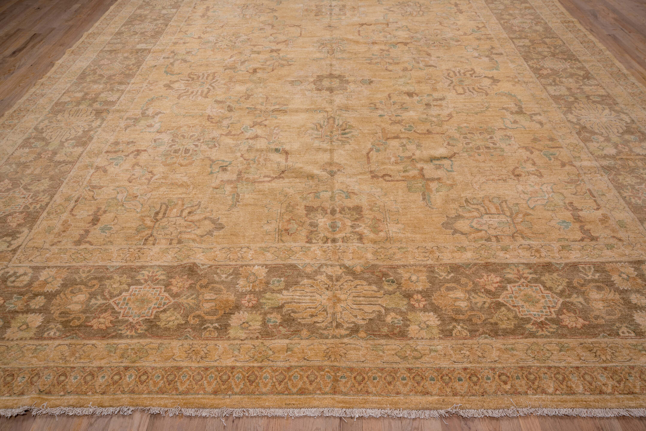 12' x 17' one-of-a-kind handmade vintage Pakistan oversize rug. Color palette: camel, taupe, brown, beige, sage, ivory