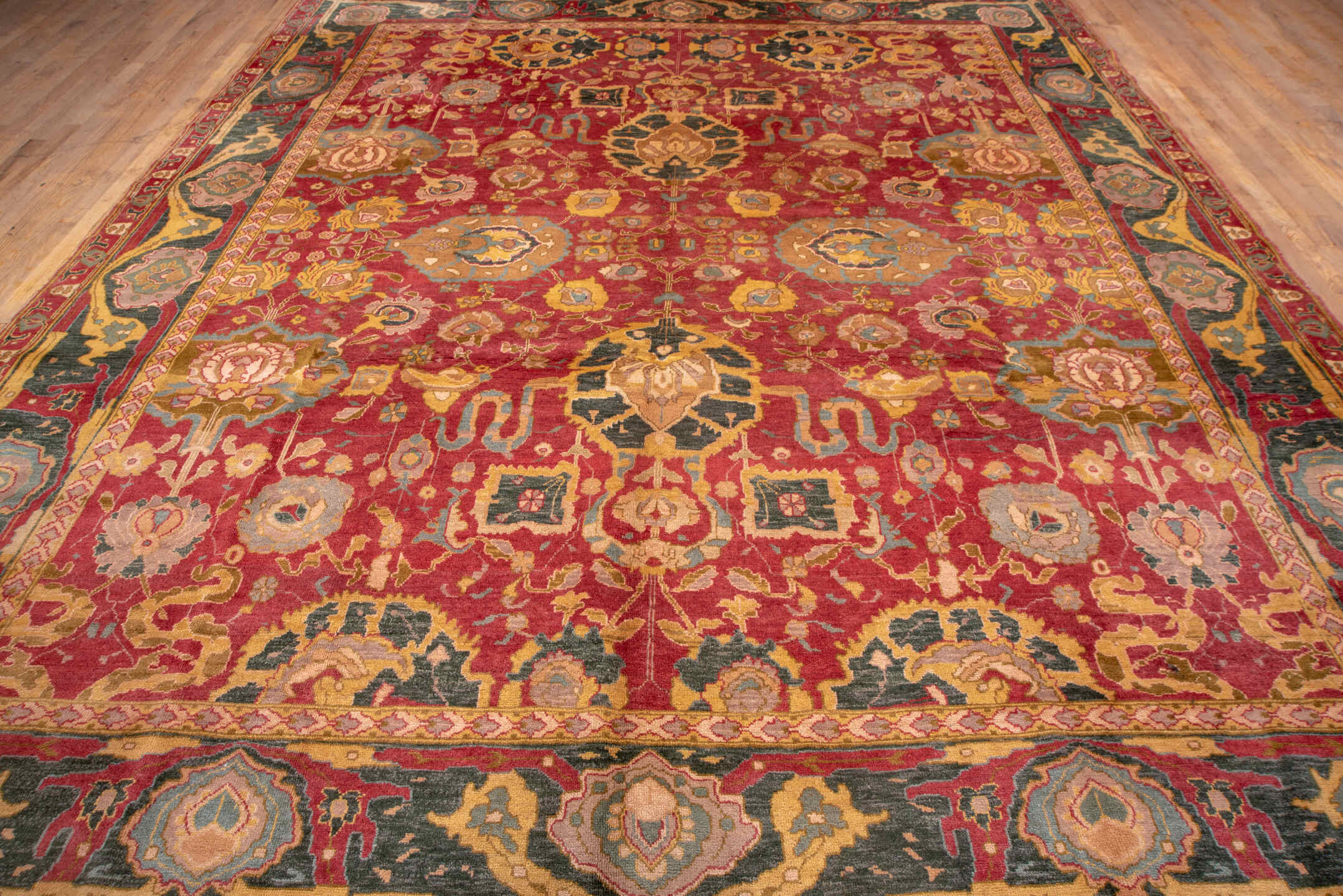 11' x 13' one-of-a-kind handmade vintage Agra oversize rug. Color palette: rust, charcoal, gold, ivory, sage, terra cotta