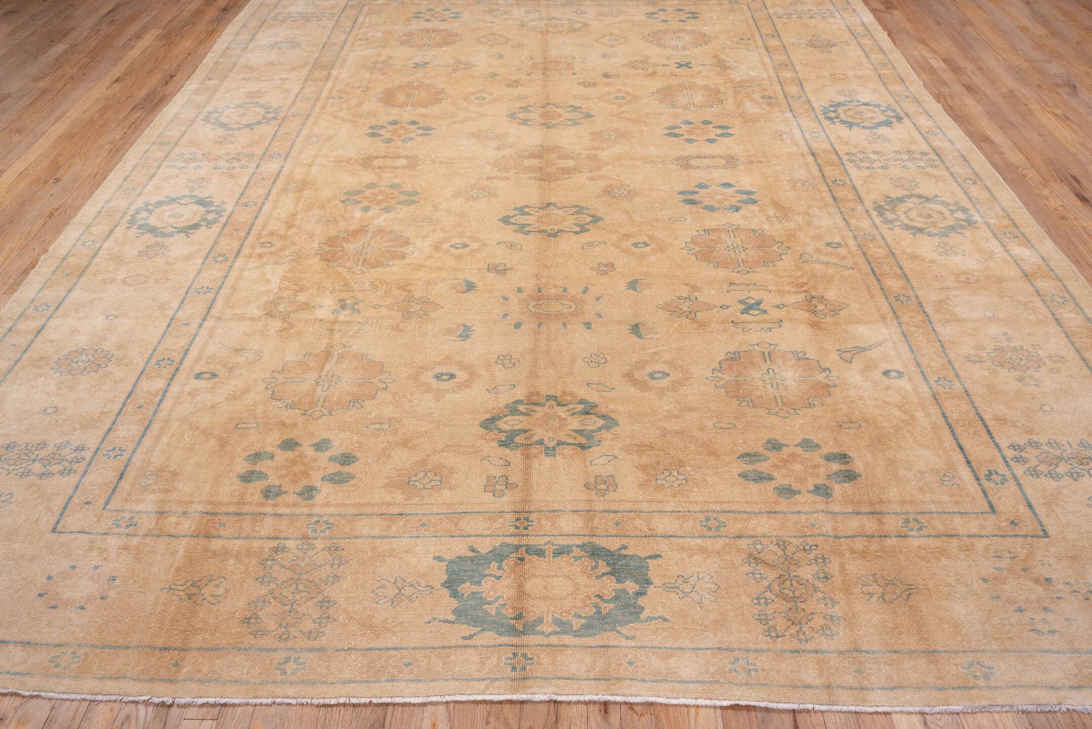 9' x 13' one-of-a-kind handmade vintage Sultanabad large size rug. Color palette: peach, camel, pale blue, ivory, taupe