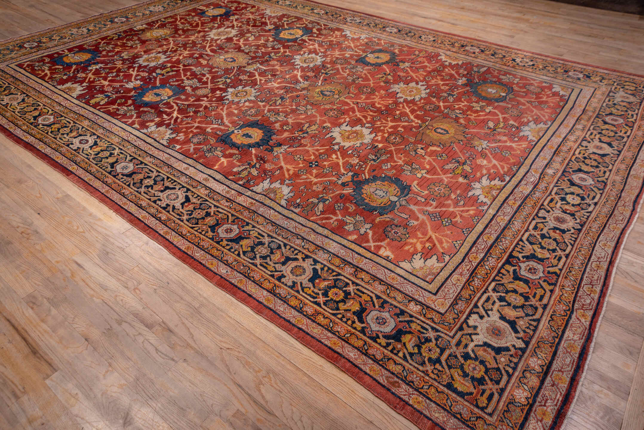 10' x 15' one-of-a-kind handmade antique Mahal rug. Color palette: terra cotta, navy, ivory, rust, gold, camel, sienna