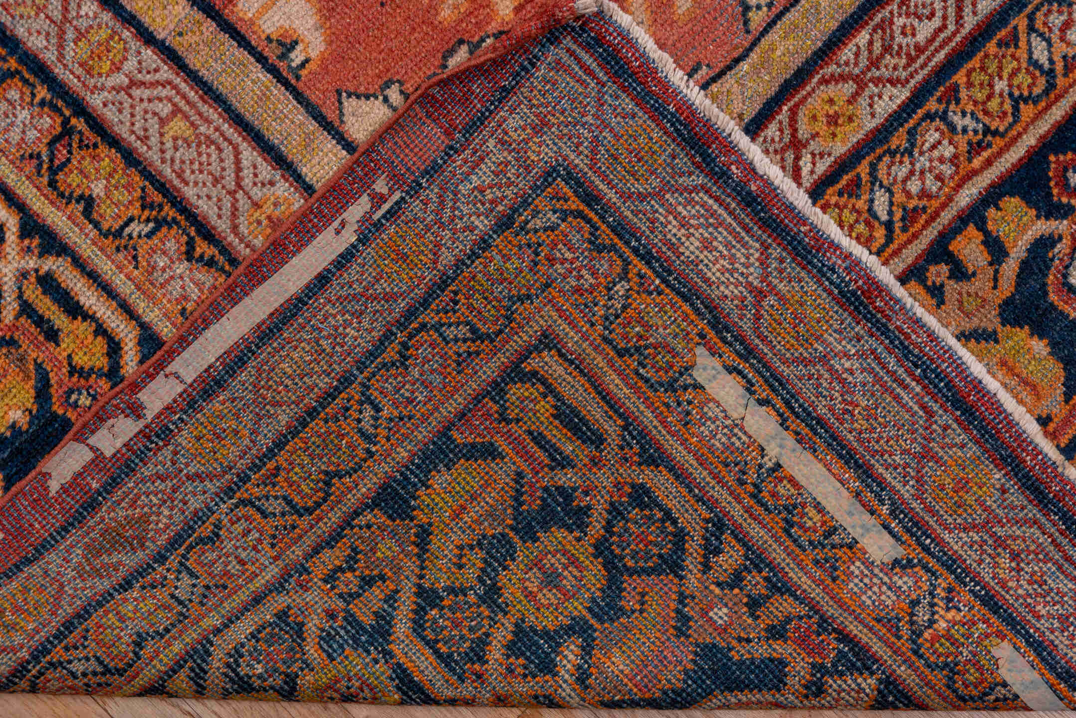 10' x 15' one-of-a-kind handmade antique Mahal rug. Color palette: terra cotta, navy, ivory, rust, gold, camel, sienna
