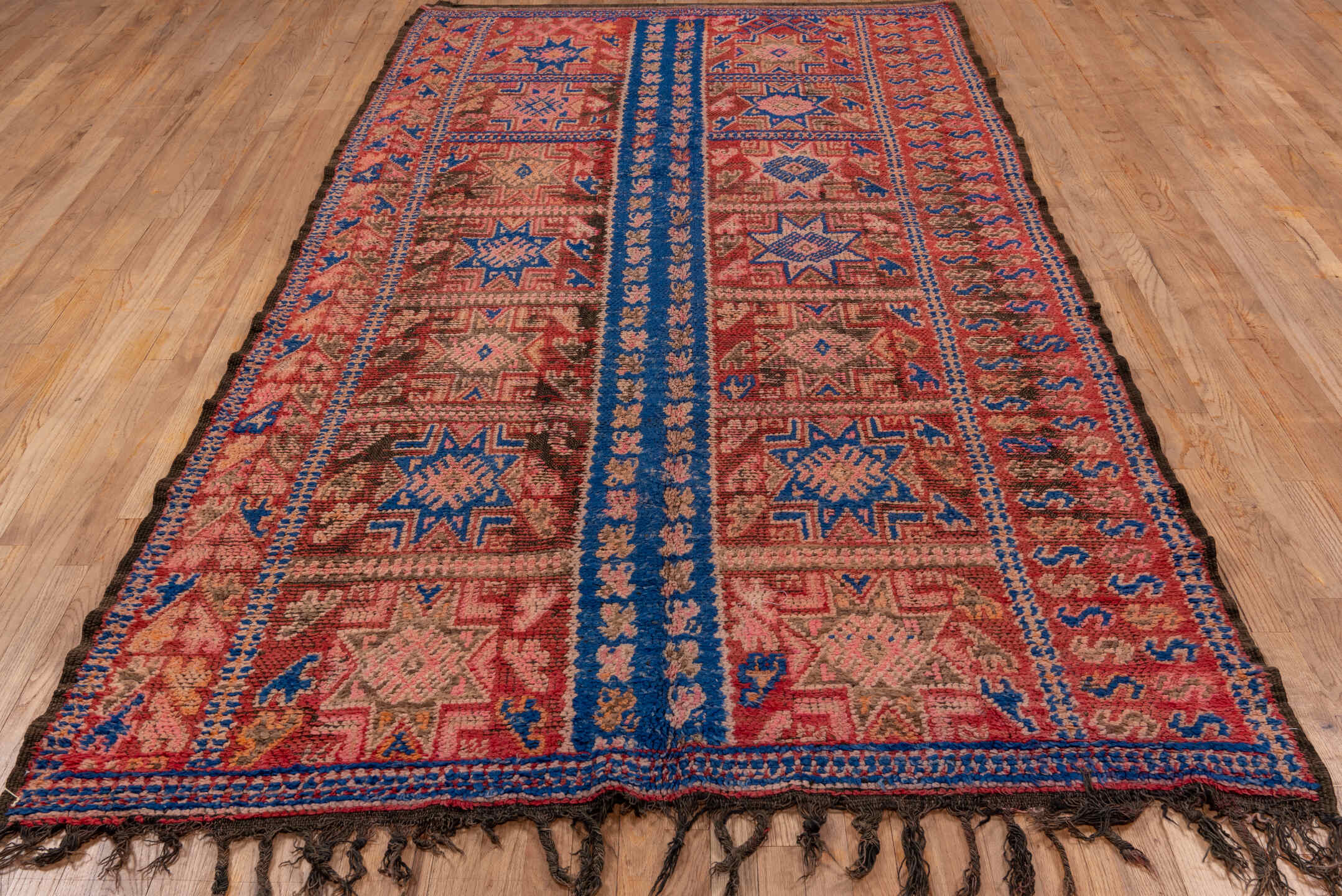 5' x 10' one-of-a-kind handmade antique Moroccan medium size rug. Color palette: rose, cobalt, rust, taupe, brown, ivory