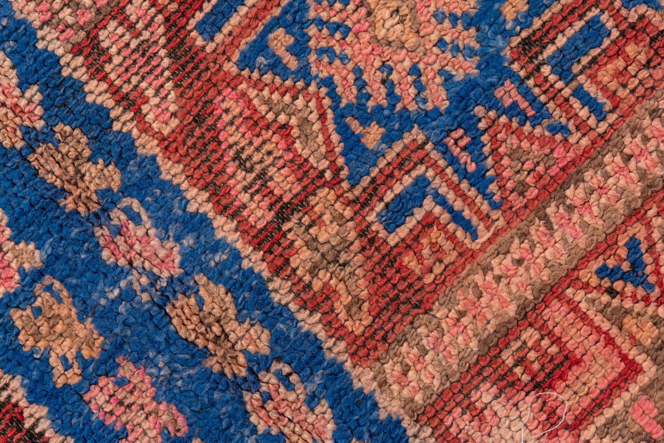 5' x 10' one-of-a-kind handmade vintage Moroccan medium size rug. Color palette: blue, brown, gray, pink, red, redwood