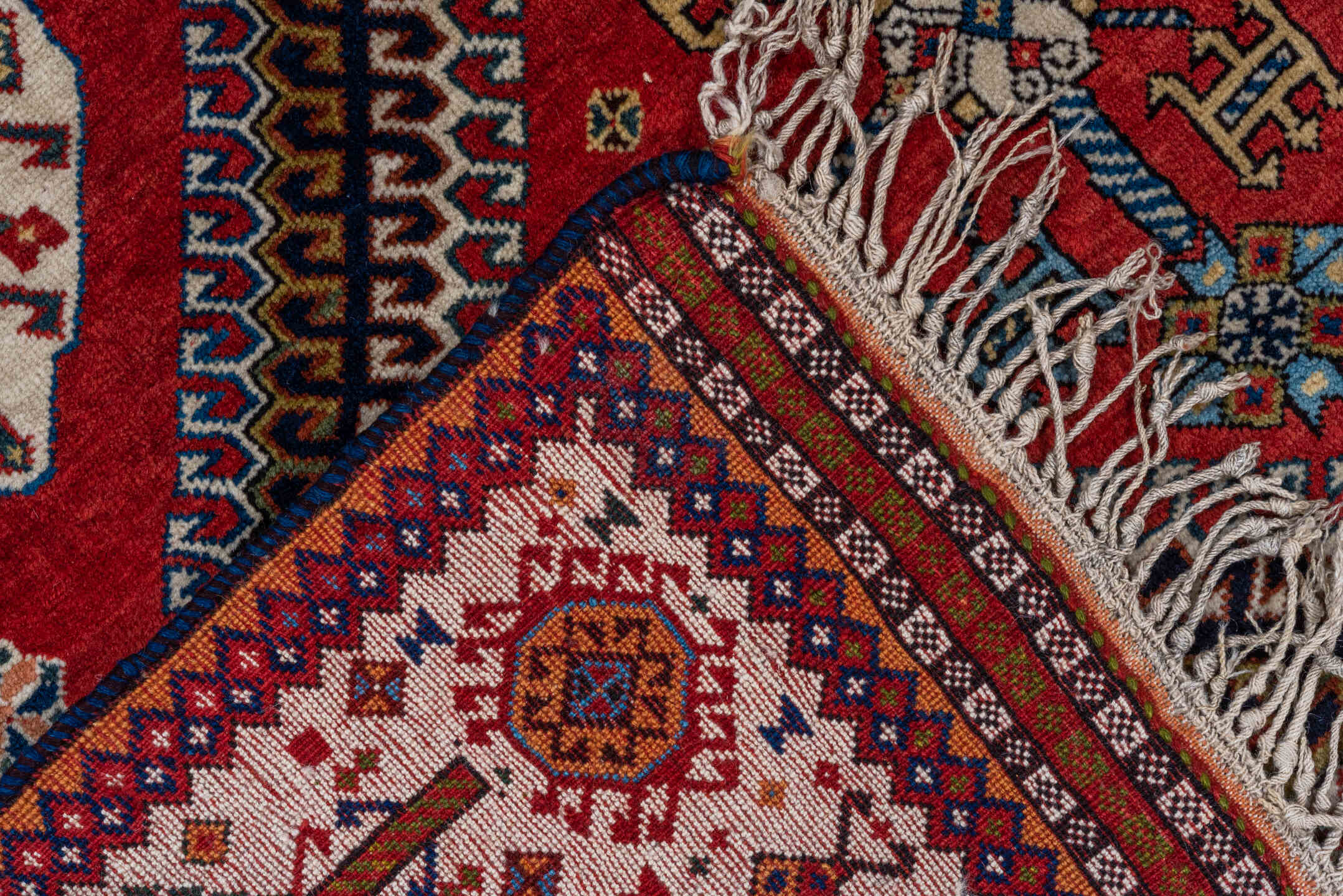 4' x 7' one-of-a-kind handmade vintage Qashqai rug. Color palette: crimson, ivory, indigo, camel, sky_blue, rust, black, red