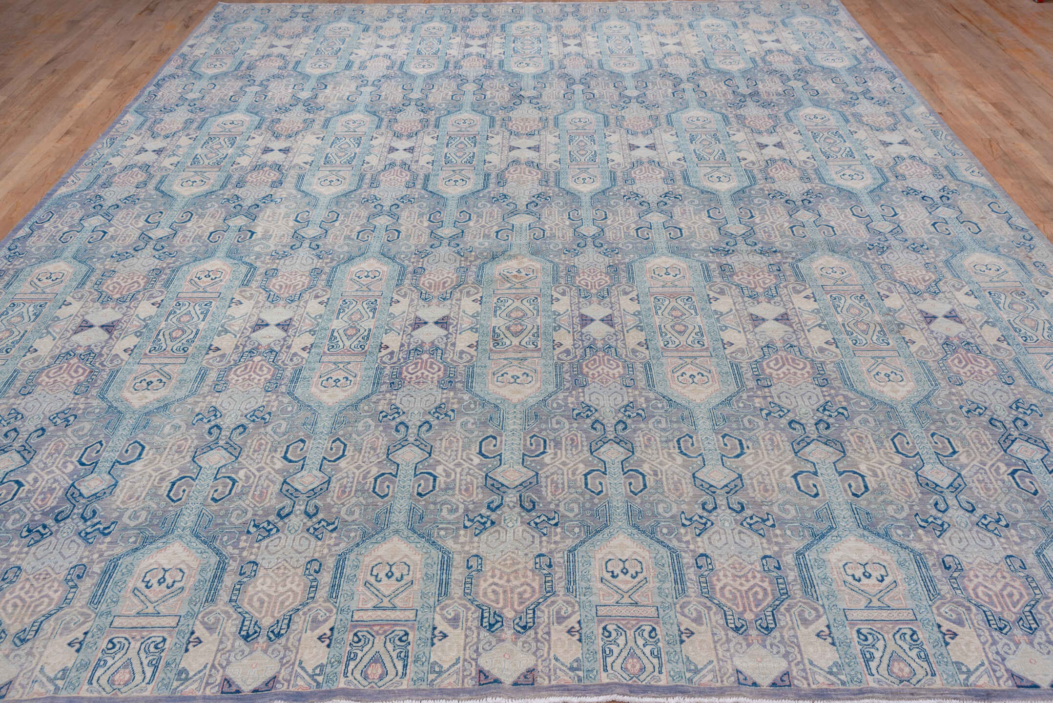 10' x 13' one-of-a-kind handmade vintage Afghan large size rug. Color palette: powder blue, ivory, pale lavender, slate