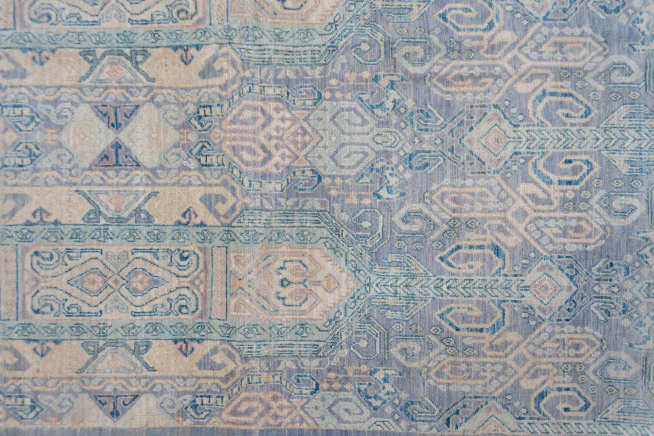 7' x 10' one-of-a-kind handmade vintage Afghan large size rug. Color palette: sky blue, ivory, pale blue, slate, taupe
