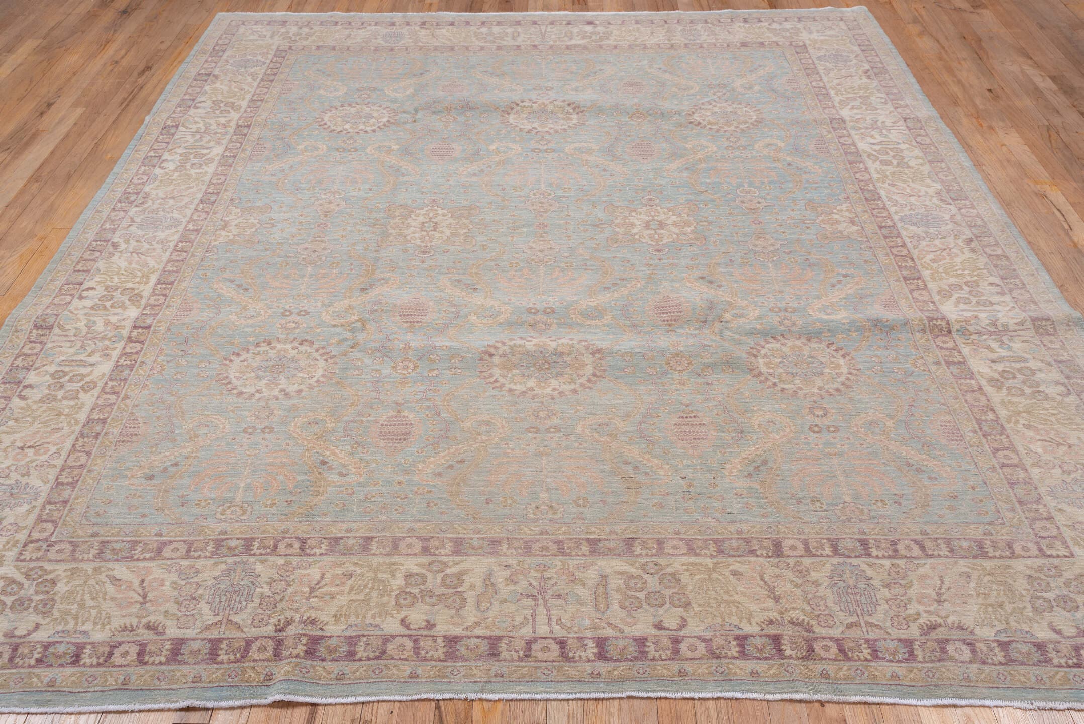 8' x 9' one-of-a-kind handmade vintage Afghan rug. Color palette: light blue, ivory, taupe, dusty rose, beige, lavender